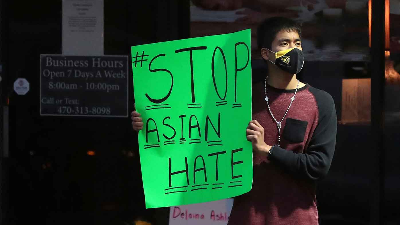 A demonstrator outside Youngs Asian Massage in Atlanta, where several women were killed.