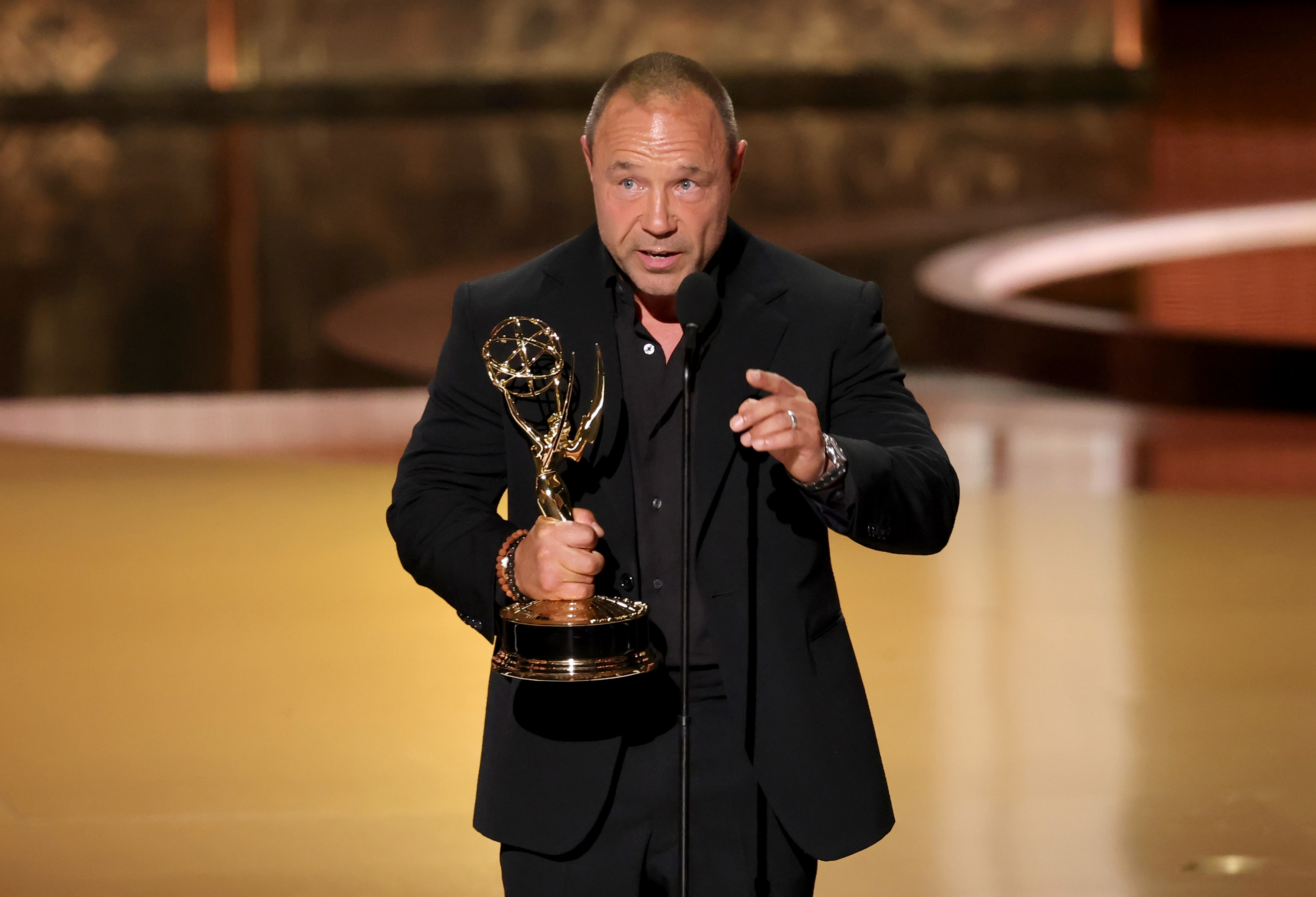 LOS ANGELES, CALIFORNIA - SEPTEMBER 14: Stephen Graham accepts the Outstanding Lead Actor in a Limited or Anthology Series or Movie award for "Adolescence" onstage during the 77th Primetime Emmy Awards at Peacock Theater on September 14, 2025 in Los Angeles, California.  (Photo by Kevin Winter/Getty Images)