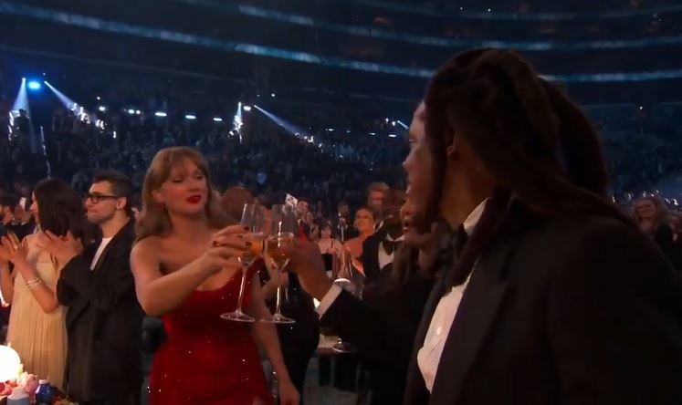 Taylor Swift cheers with Jay Z