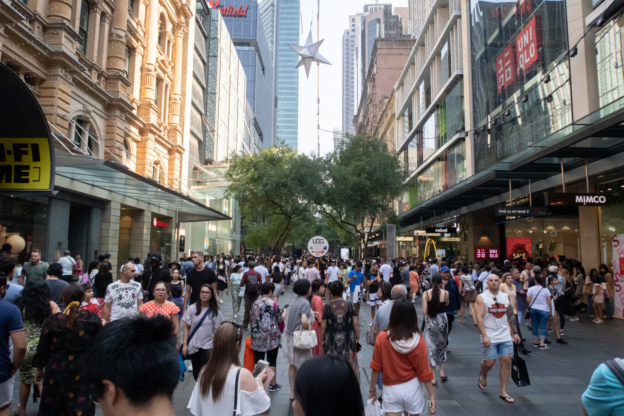 people walking on the busy Pitt Street retail area in Sydney during the boxing day sales