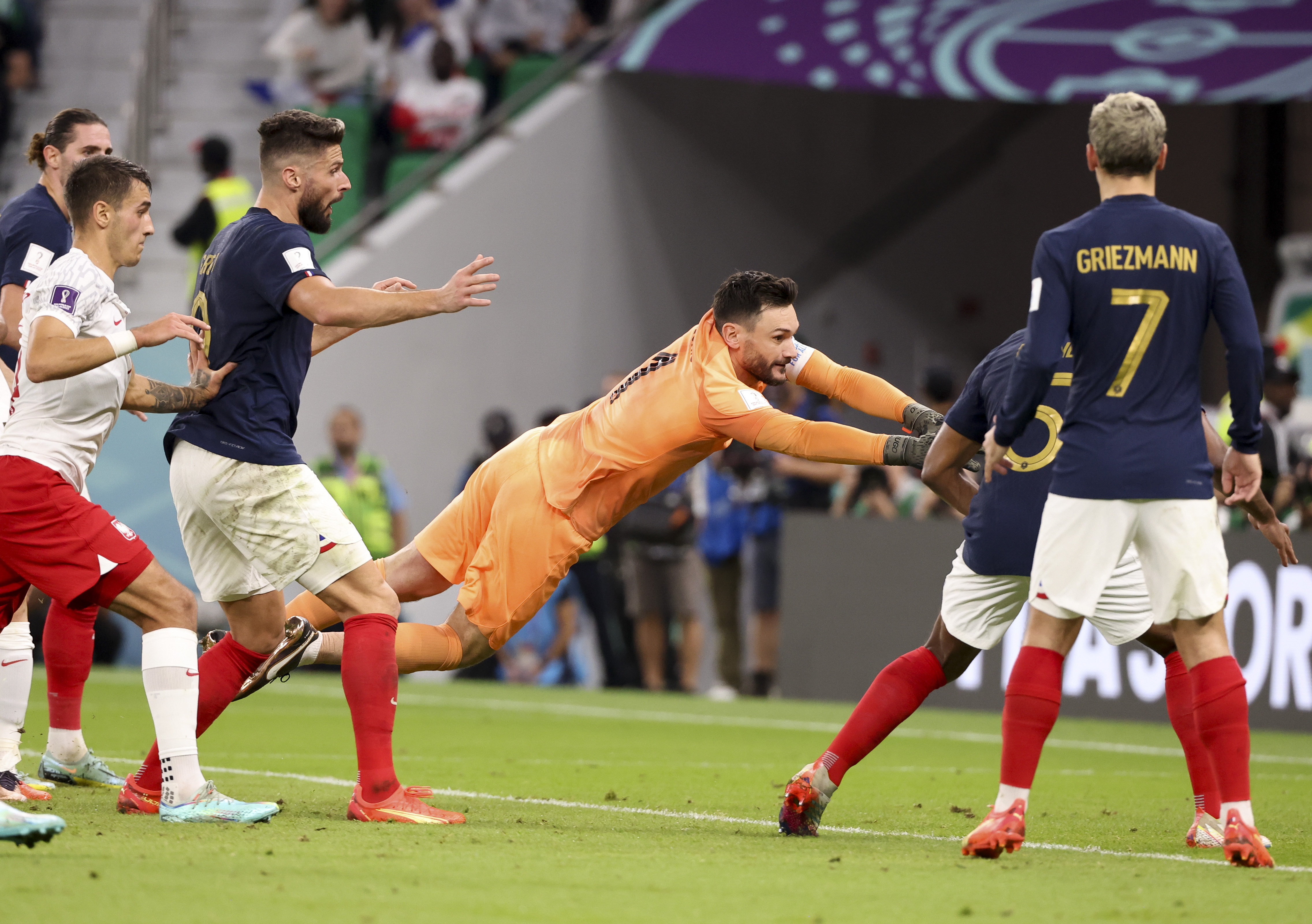 Goalkeeper of France Hugo Lloris dives to prevent a Poland goal. (Photo by Jean Catuffe/Getty Images)