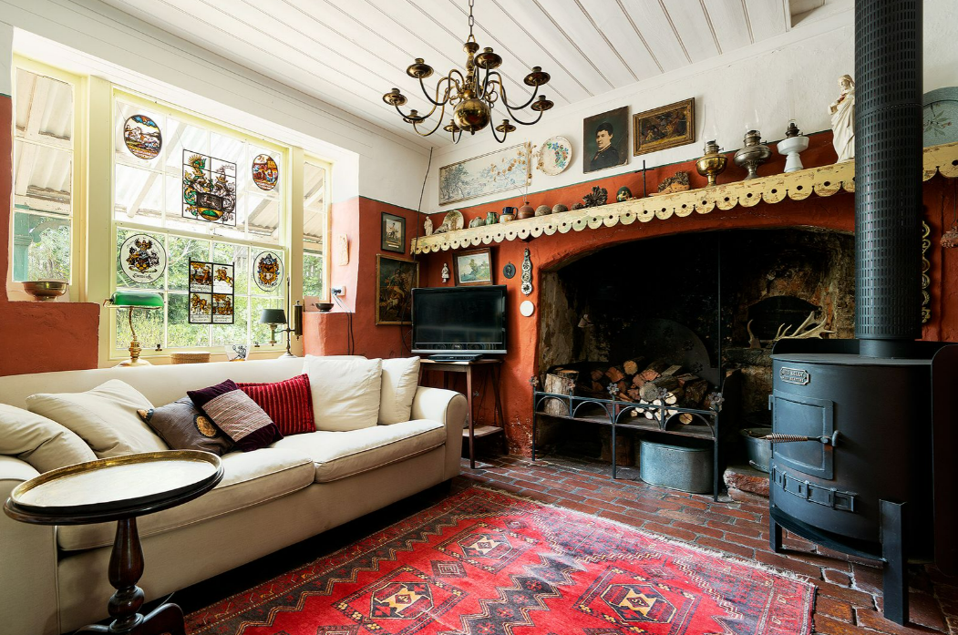 This home for sale in Victoria has a trapdoor to a room you'd never expect.