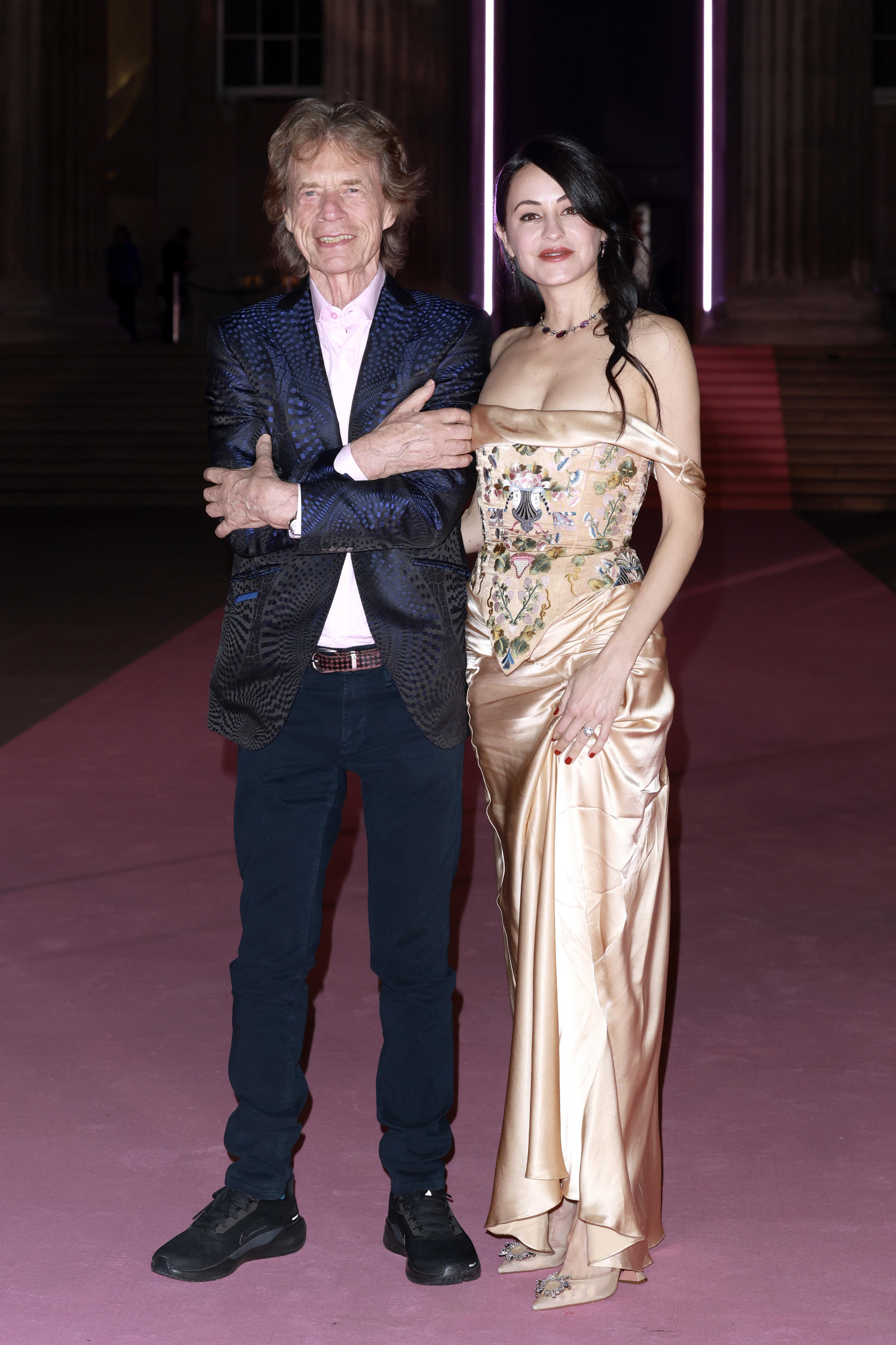 Mick Jagger and Melanie Hamrick at the British Museum Ball in London, Saturday, October 18, 2025. 