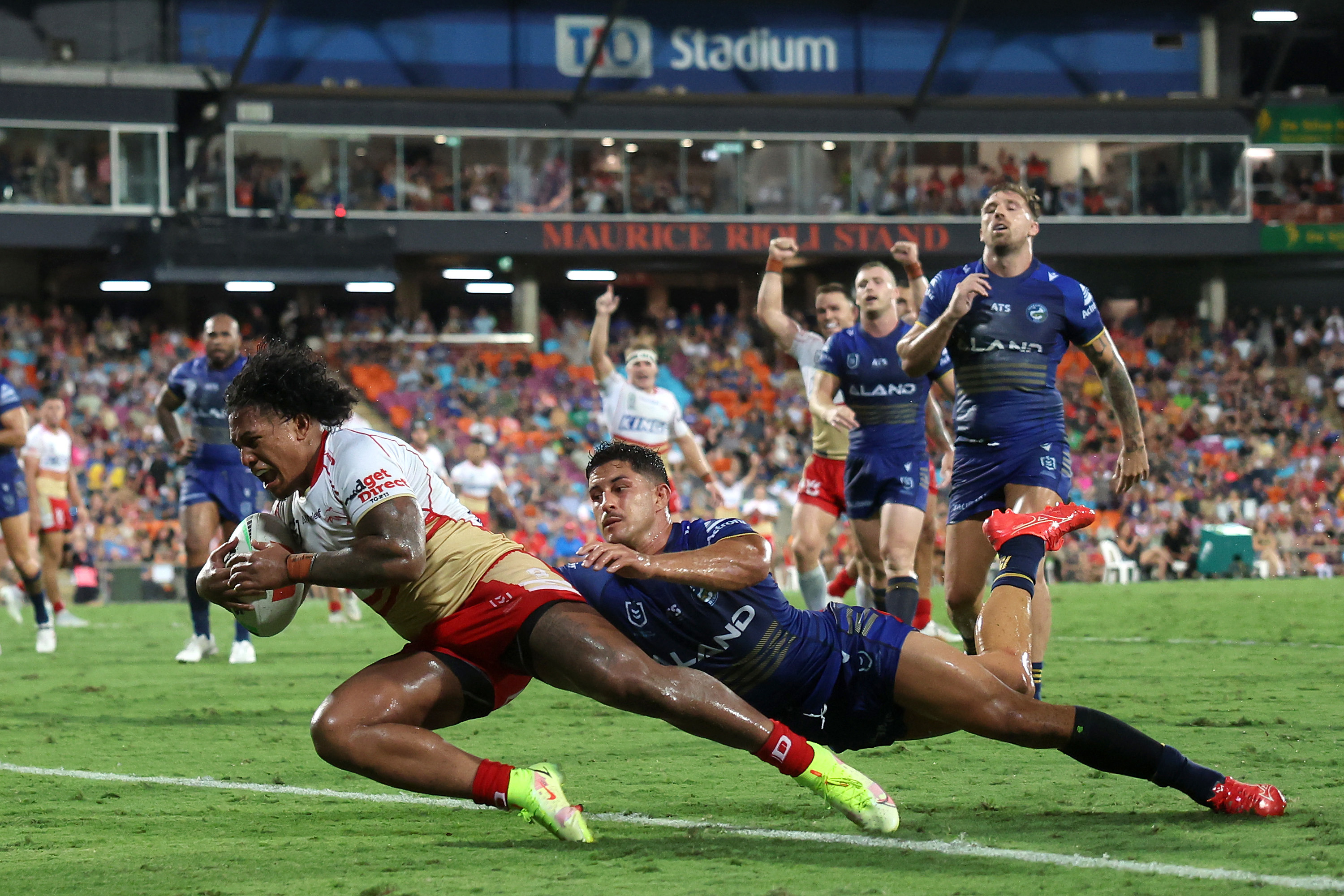 Tesi Niu of the Dolphins scores. Parramatta Eels V Dolphins