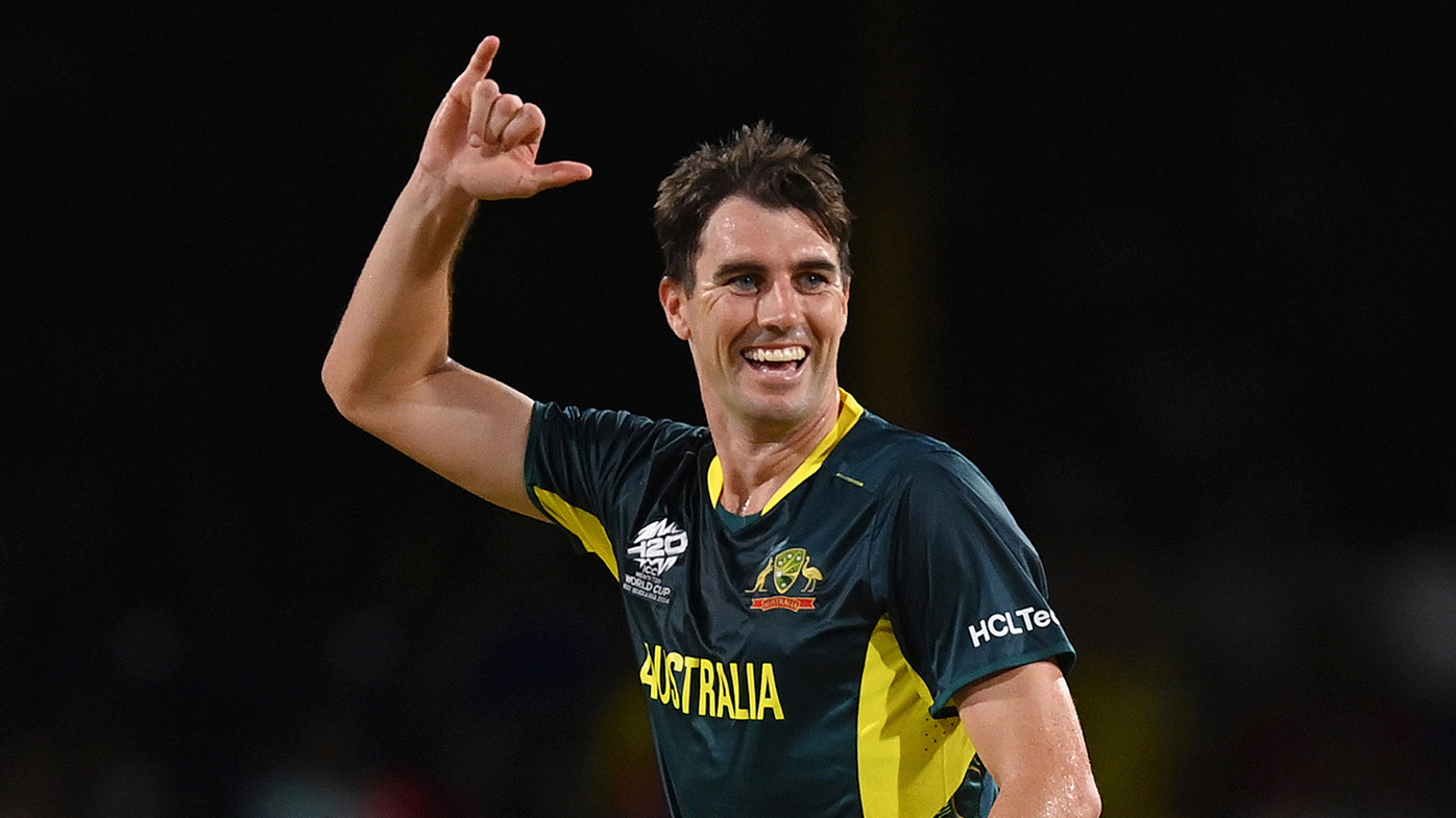 Pat Cummins of Australia celebrates after dismissing Gulbadin Naib of Afghanistan (not pictured) for his hat trick during the ICC Men's T20 Cricket World Cup West Indies & USA 2024 Super Eight match between Afghanistan and Australia at Arnos Vale Ground on June 22, 2024 in St Vincent, Saint Vincent and The Grenadines. (Photo by Gareth Copley/Getty Images)