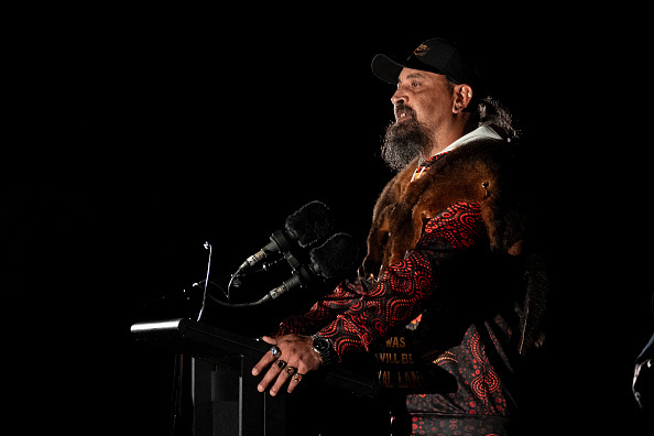 Uncle Mark Brown conducts the Welcome to Country during Saturday's dawn service at the Shrine of Remembrance.