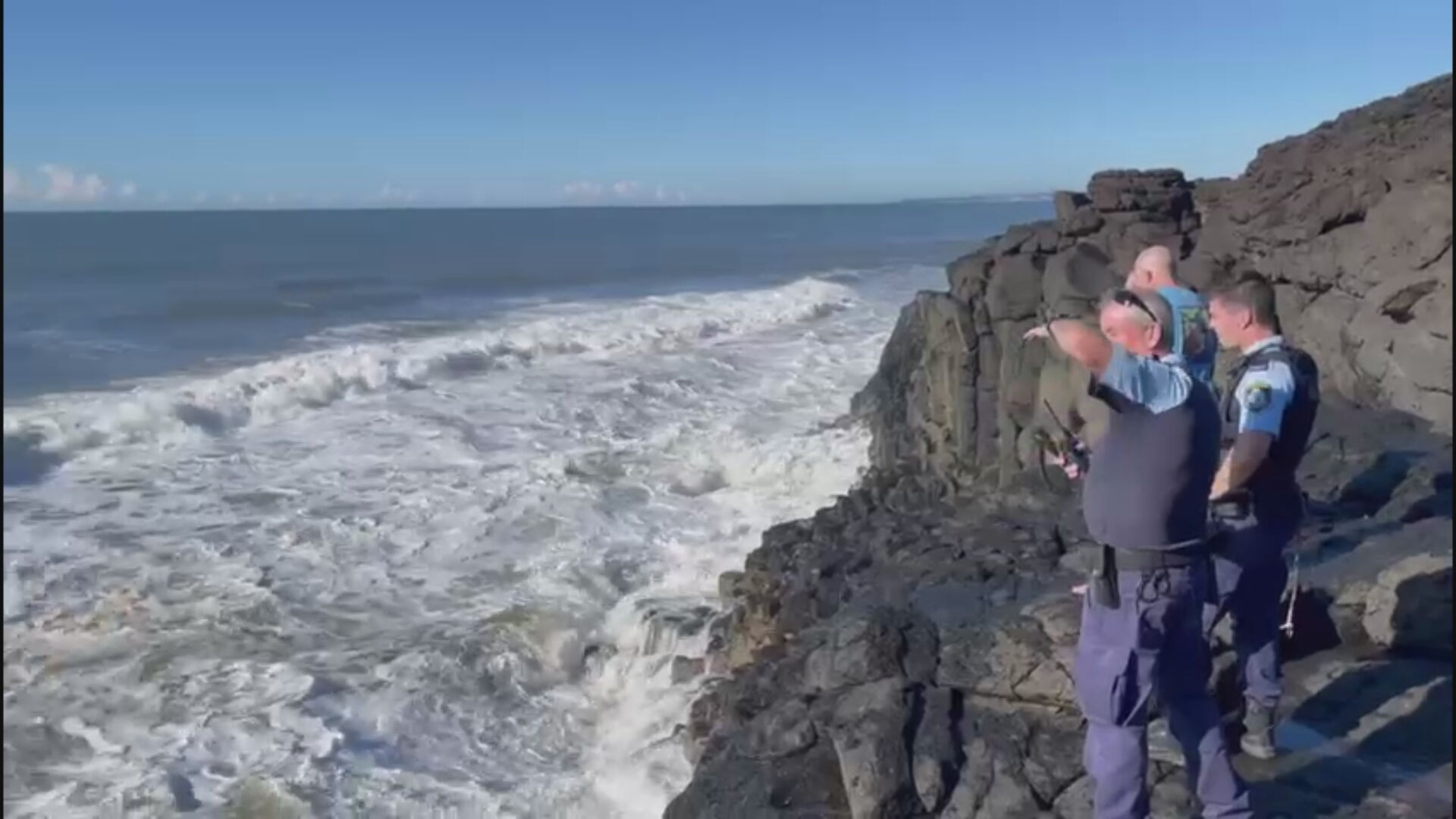 Police were at the scene but able to get to the man near the rocks.