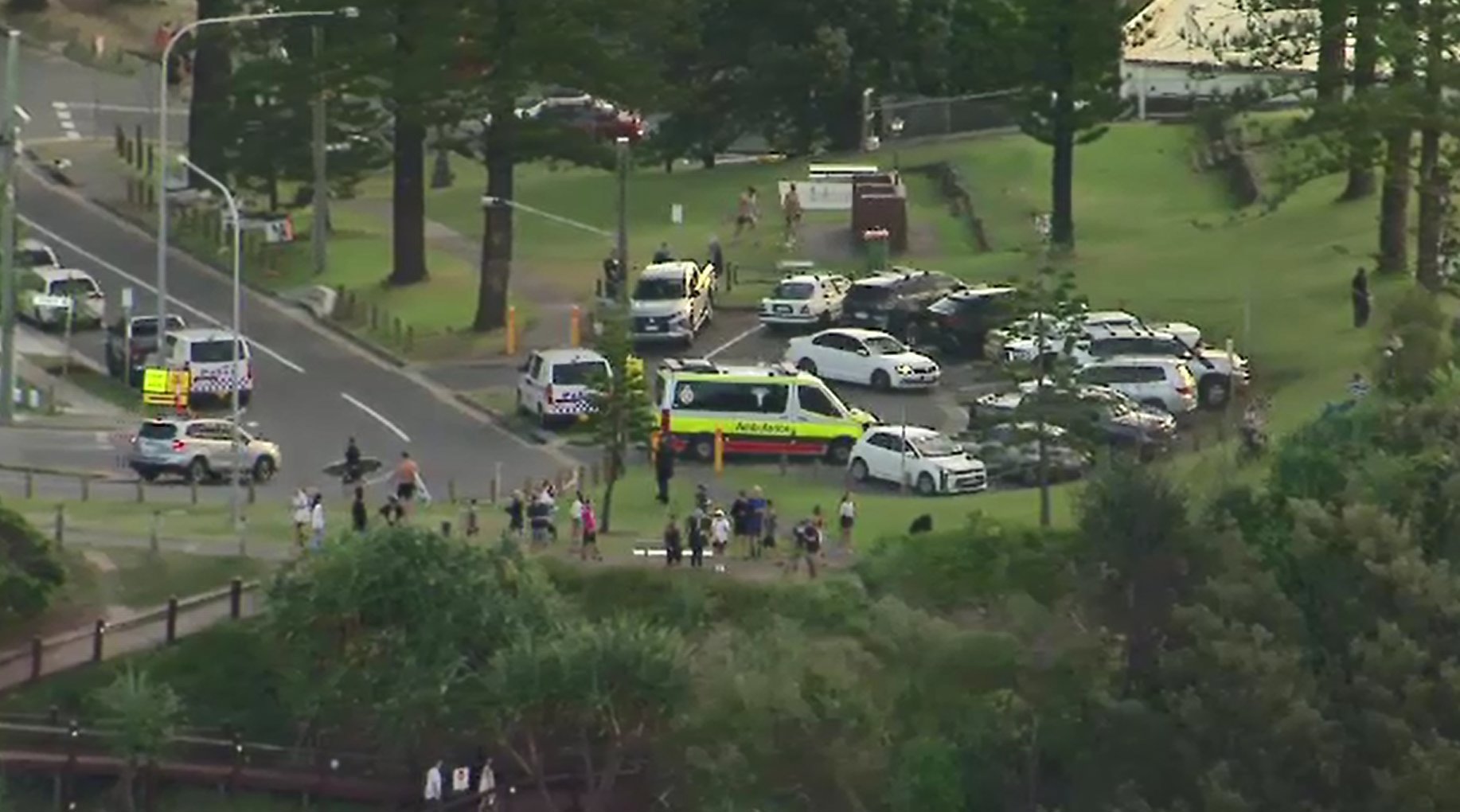 A woman has drowned in rough surf near Snapper Rocks on the Gold Coast.