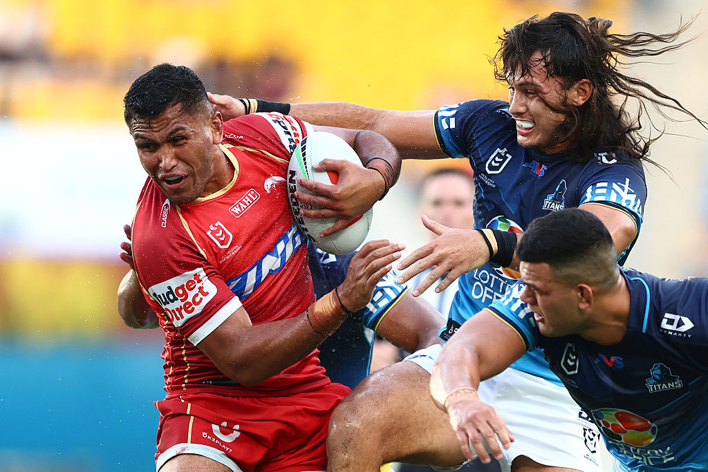 Daniel Saifiti of the Dolphins is tackled.