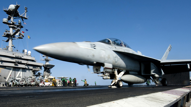 An F/A-18F Super Hornet from the Black Aces of Strike Fighter Squadron (VFA) 41 launches off the flight deck of the aircraft carrier USS John C. Stennis.