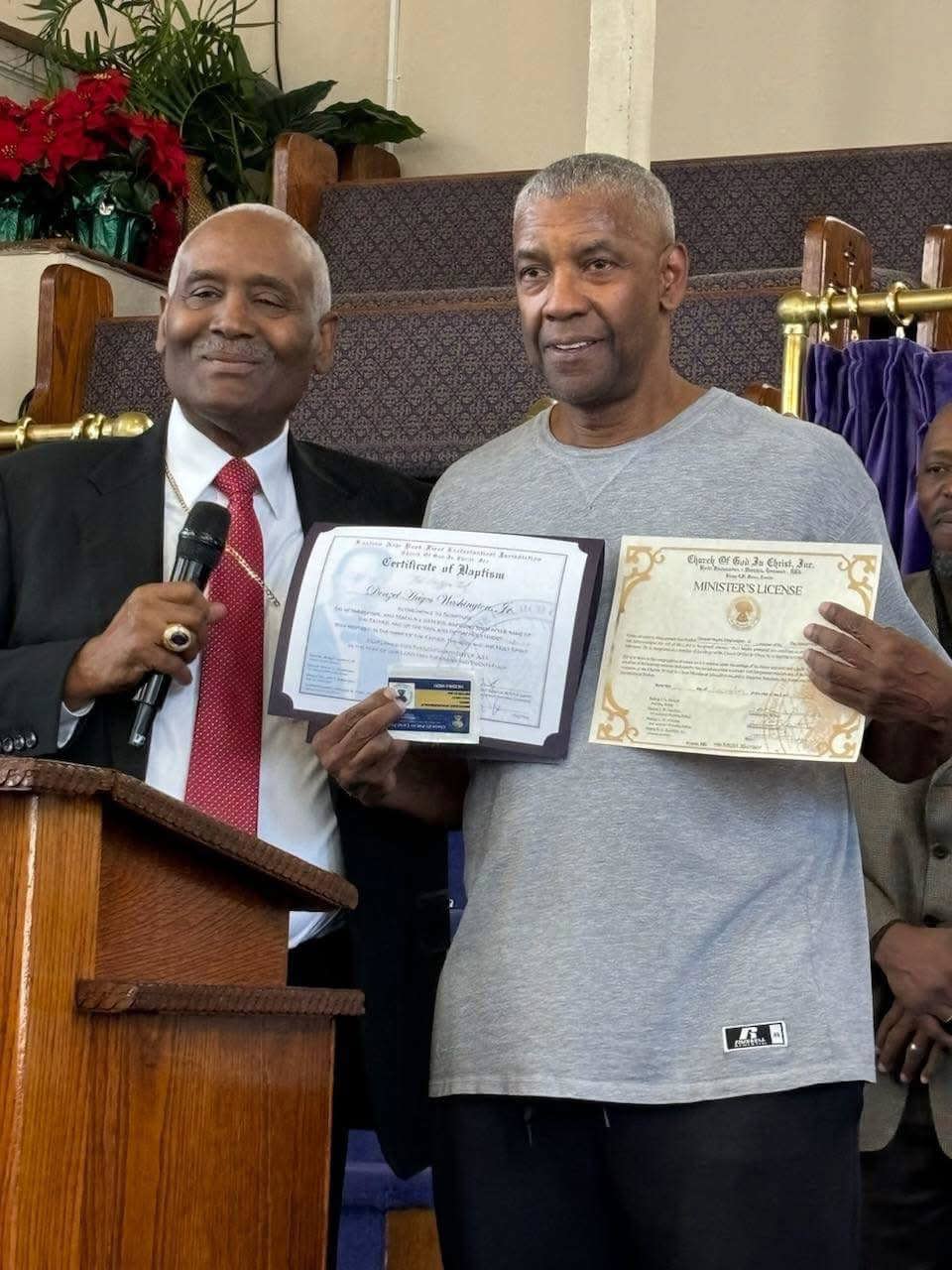 Denzel Washington receives his Certificate of Baptism and Minister's License.