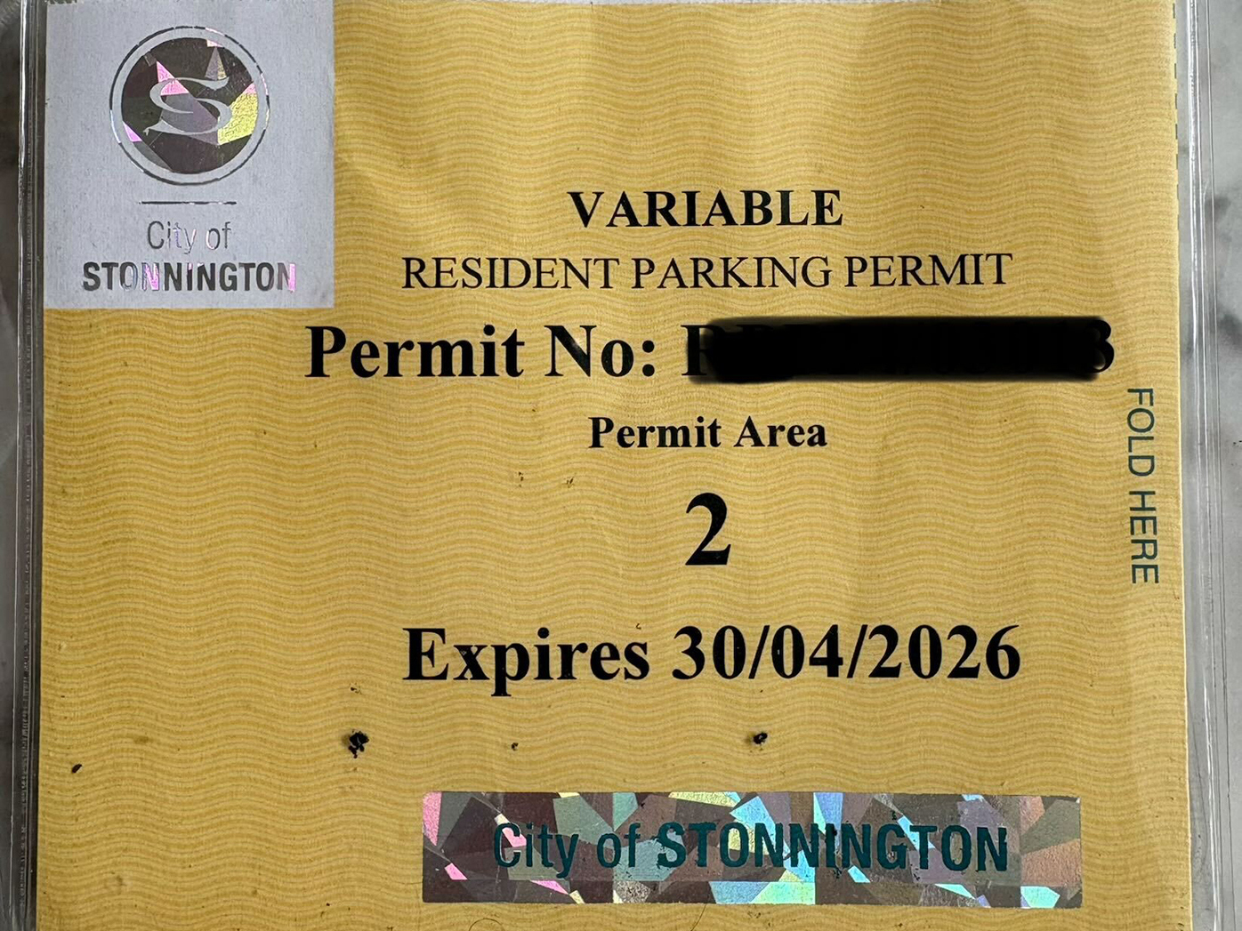 Olivia Stiles' paper permit used to allow her to park outside her home for free.