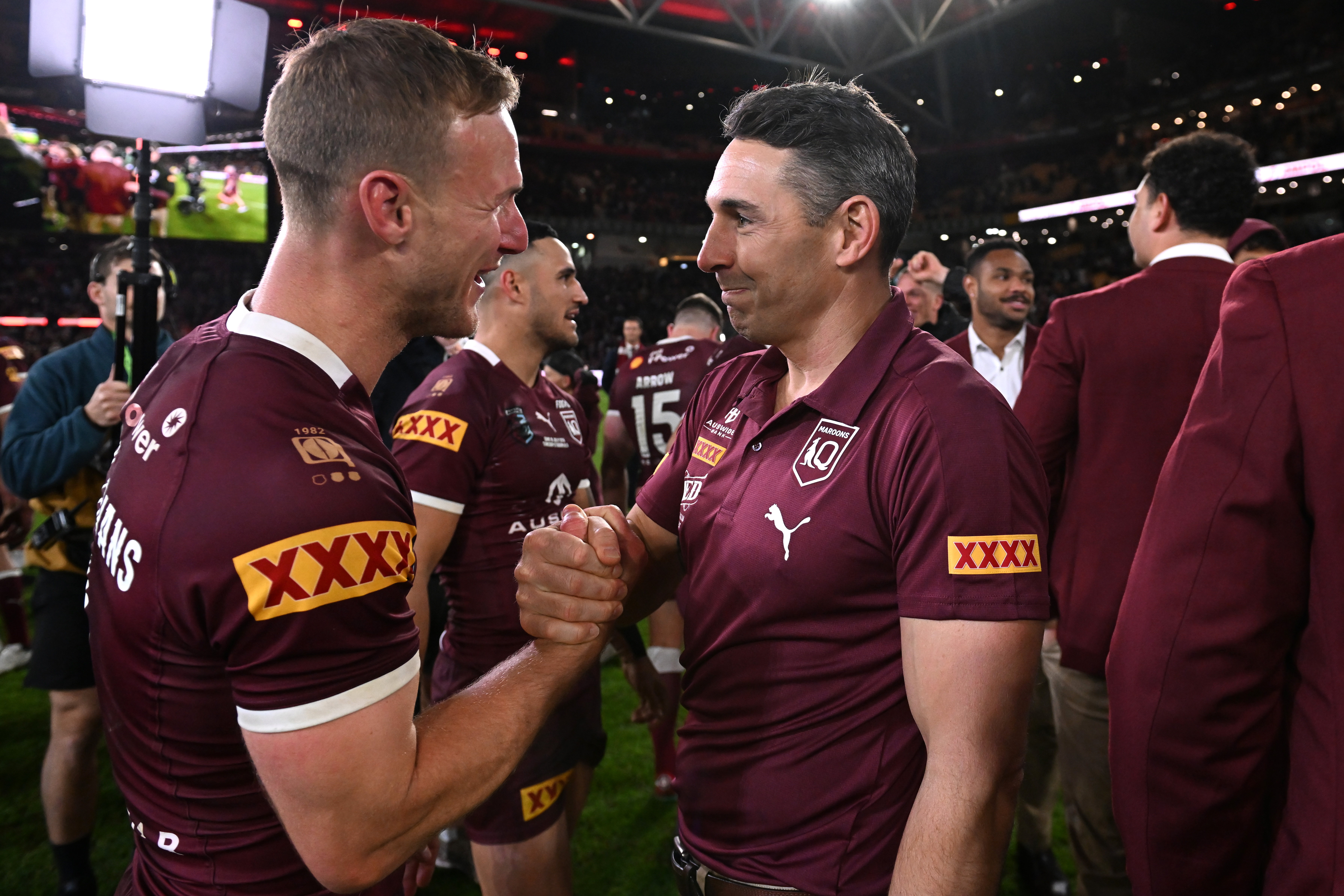 Maroons head coach Billy Slater embraces captain Daly Cherry-Evans after securing the Origin series 2-1.