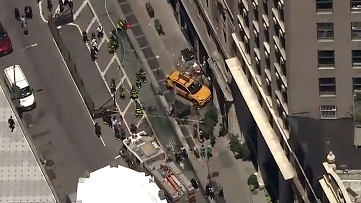 The taxi mowed down several pedestrians and pinned two women underneath the vehicle