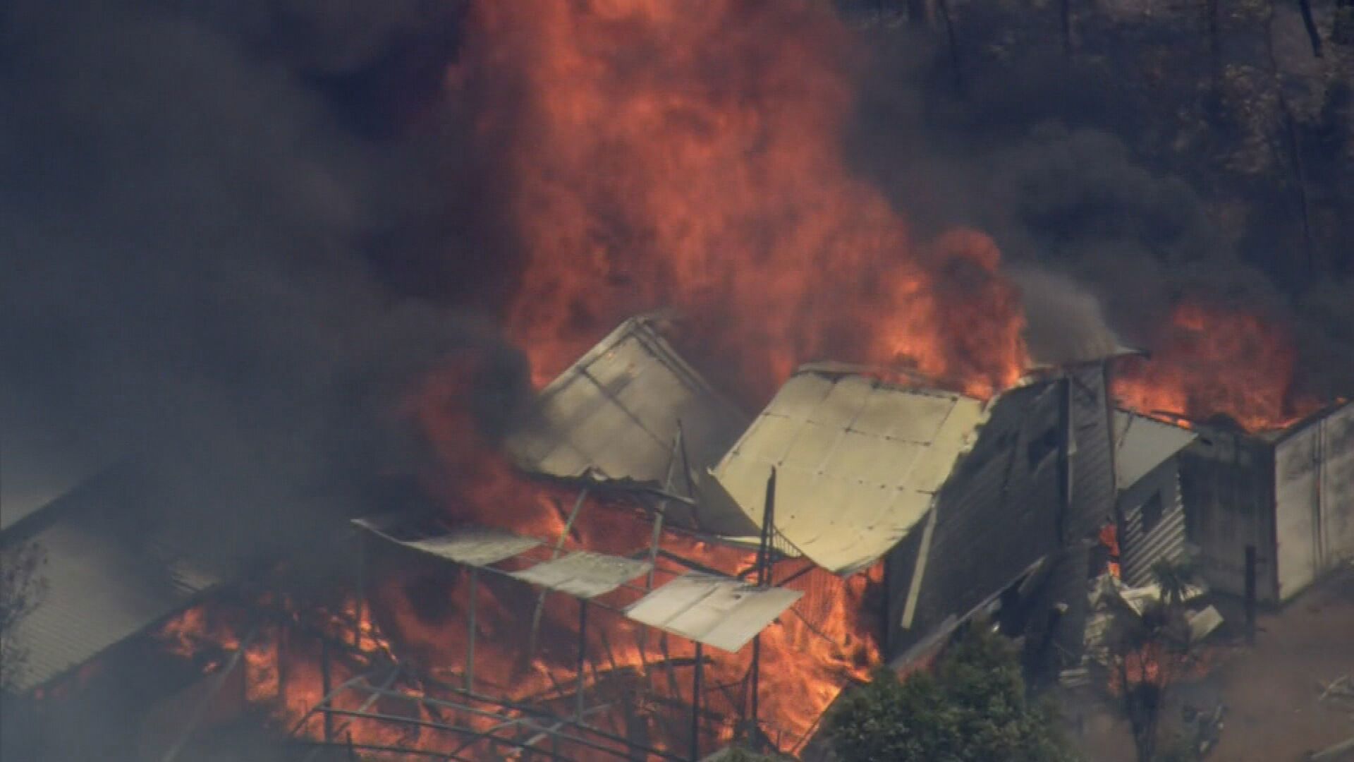 A fire tears through a property in Parkerville in Western Australia.