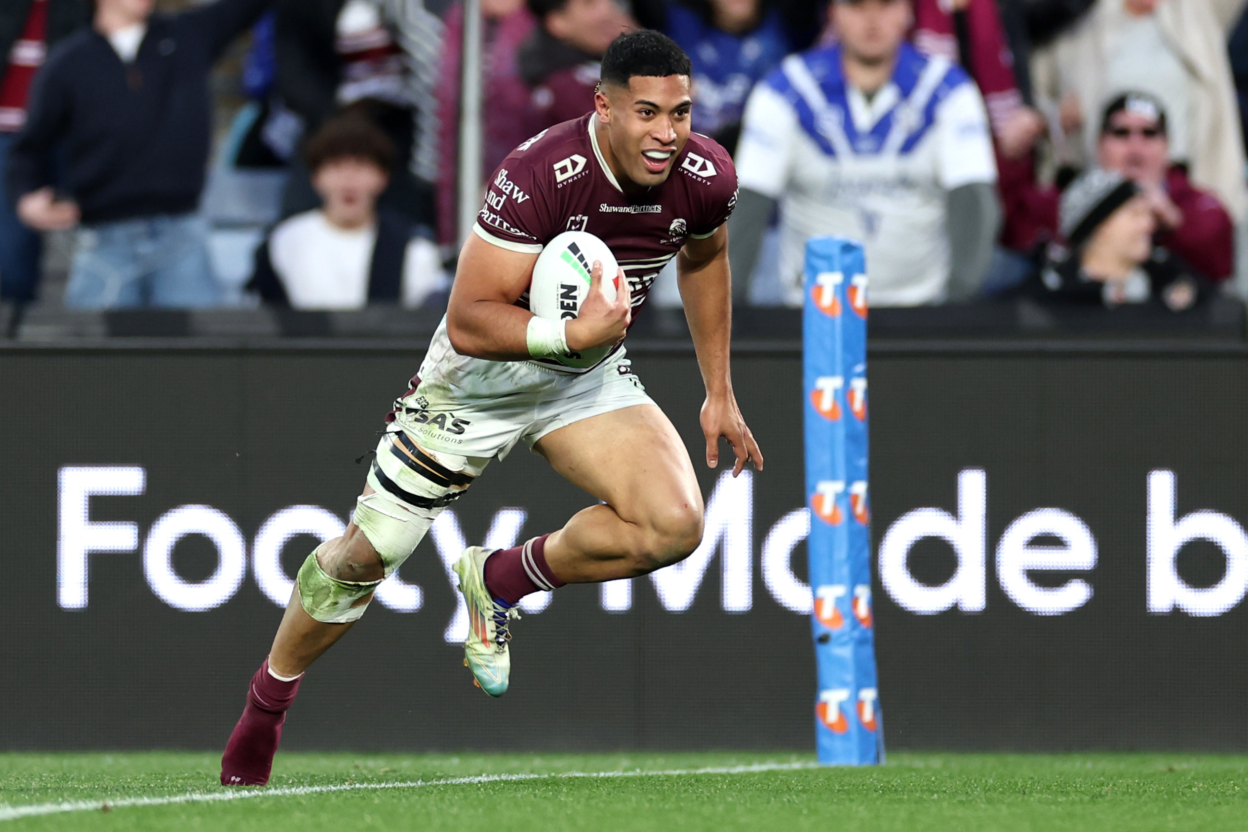 Tolutau Koula scores a try during the NRL elimination final match between Canterbury Bulldogs and Manly Sea Eagles at Accor Stadium on September 15, 2024 in Sydney, Australia. 