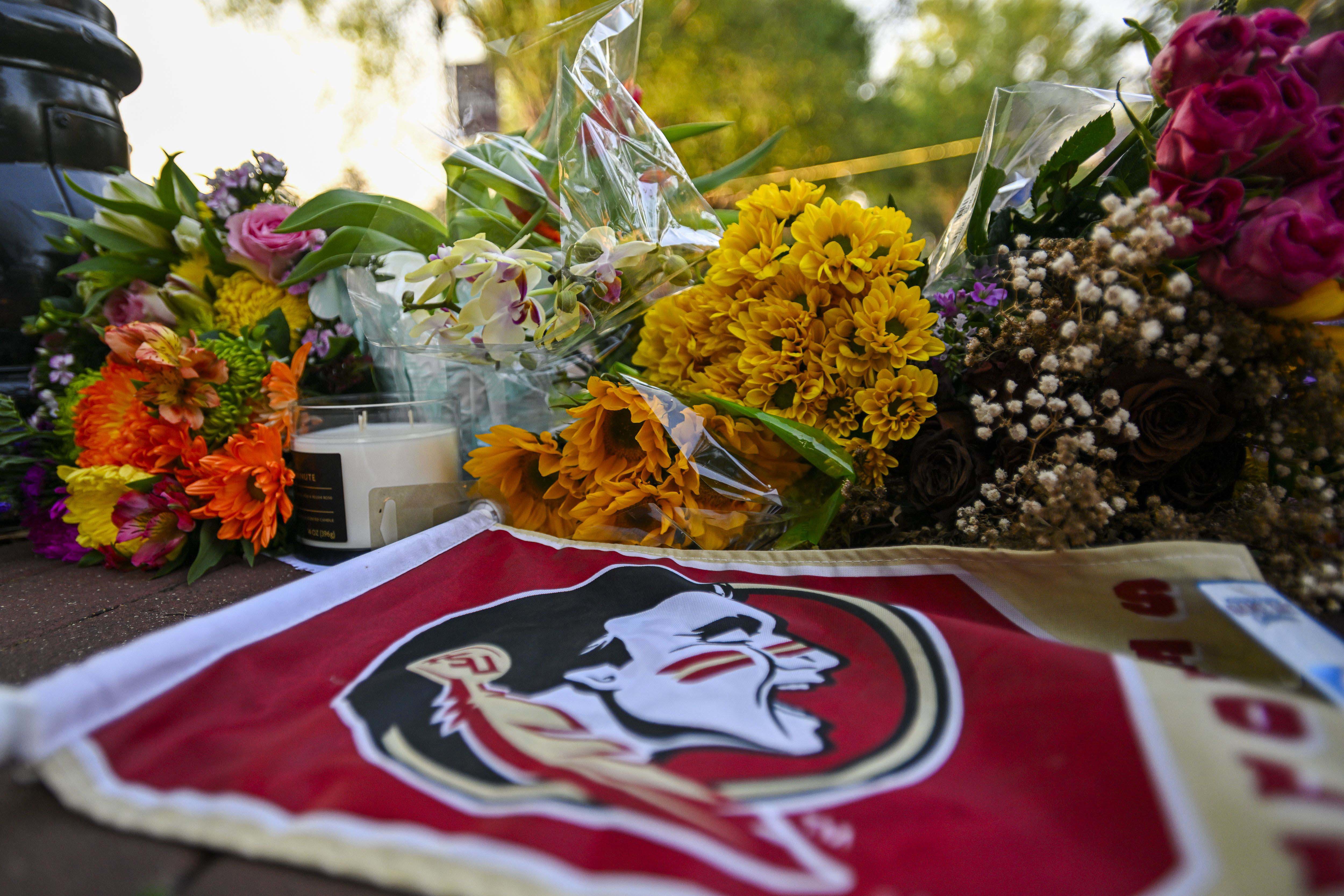 A vigil is held near the Florida State University student centre on , following the shooting.