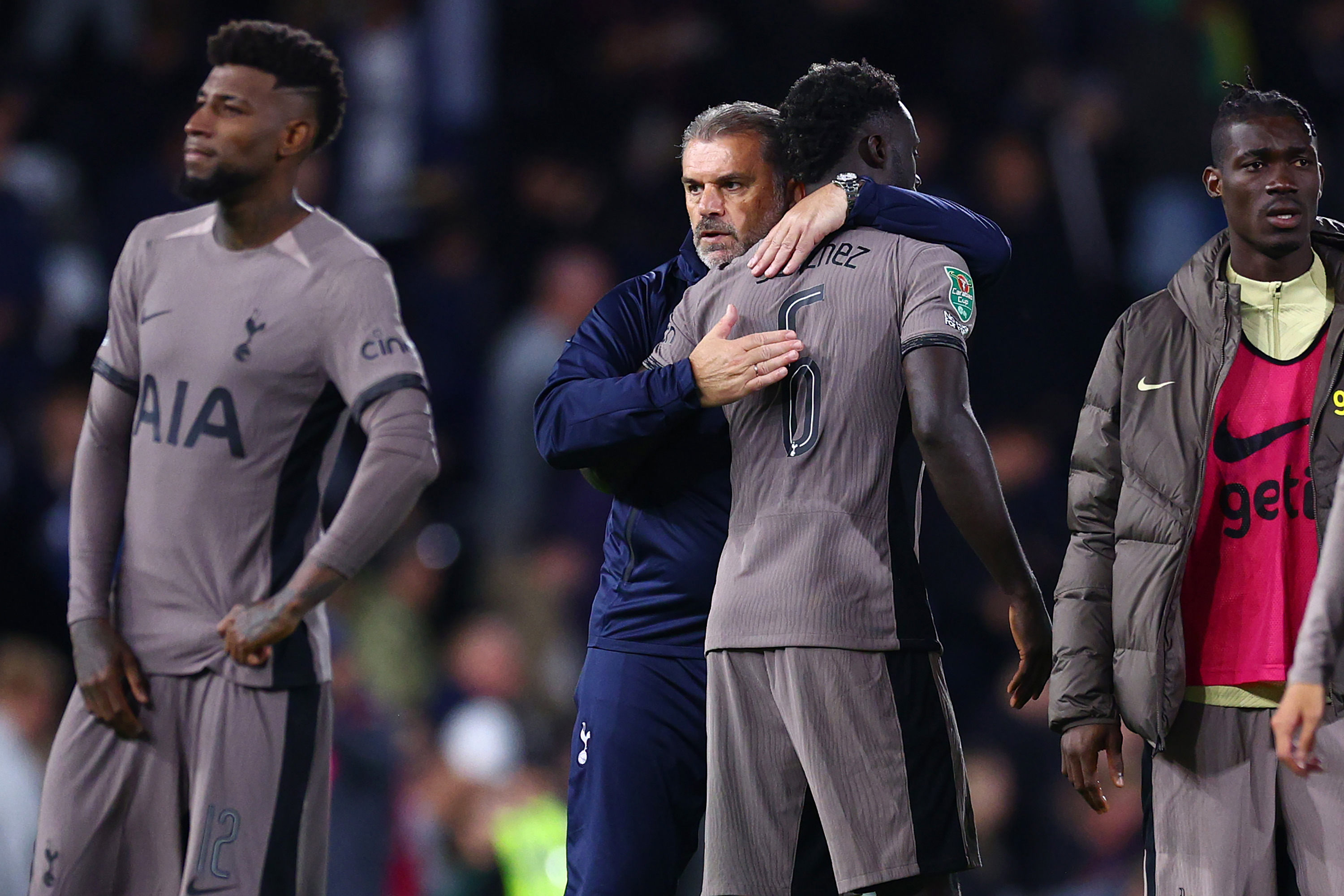 Ange Postecoglou, manager of Tottenham Hotspur, consoles Davinson Sanchez.
