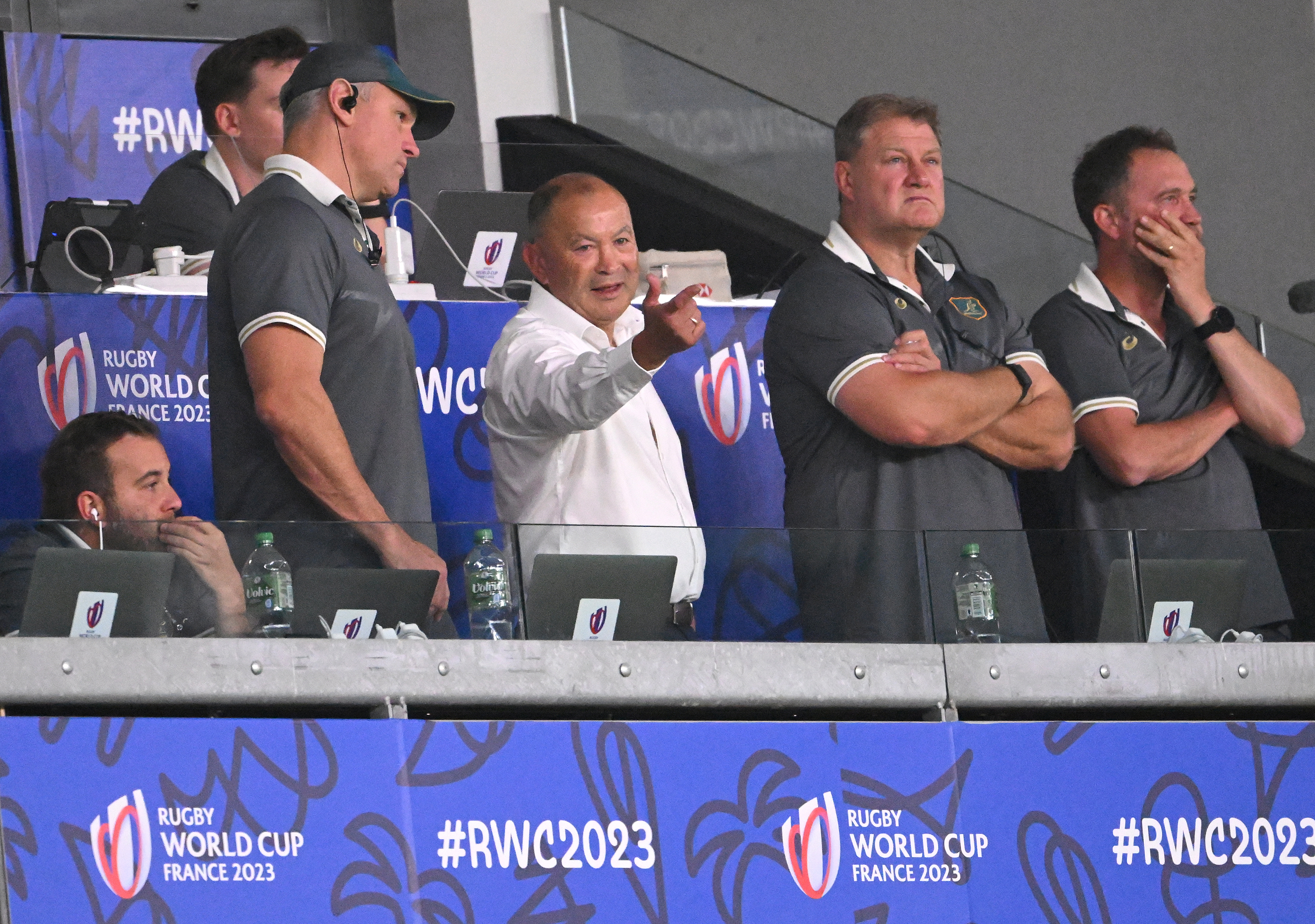 Australia head coach Eddie Jones (front) looks on from the coaches box during the Rugby World Cup match against Portugal.