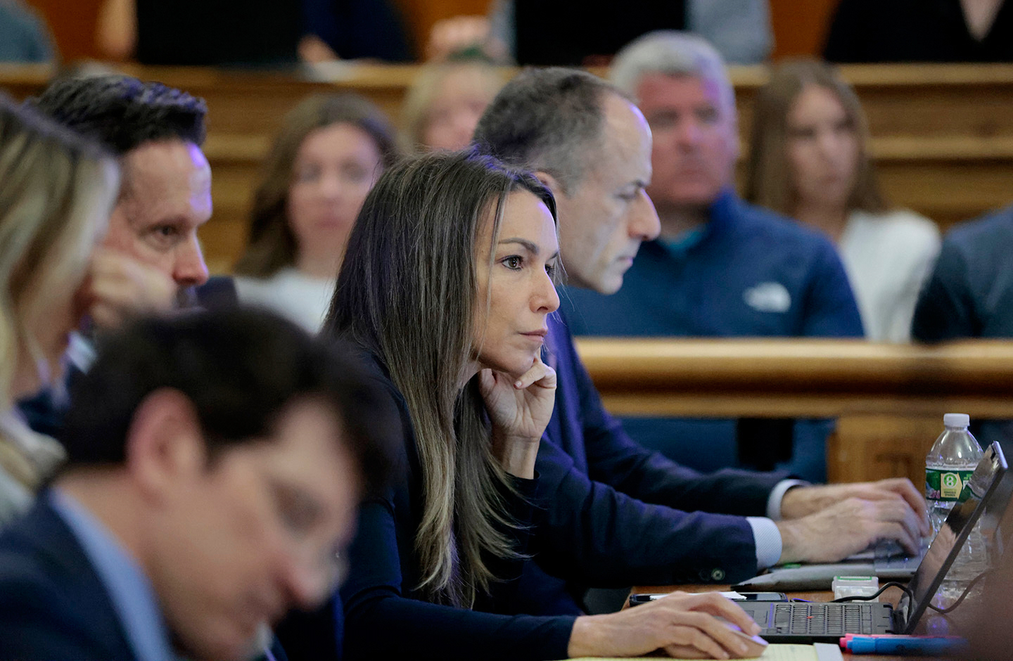 Karen Read listens to the testimony of Cellebrite digital intelligence expert Ian Wiffin, during her murder retrial, in Norfolk Superior Court, in front of Judge Beverly J. Cannone, in Dedham, Mass., Monday April 28, 2025. (Pat Greenhouse/The Boston Globe via AP, Pool)