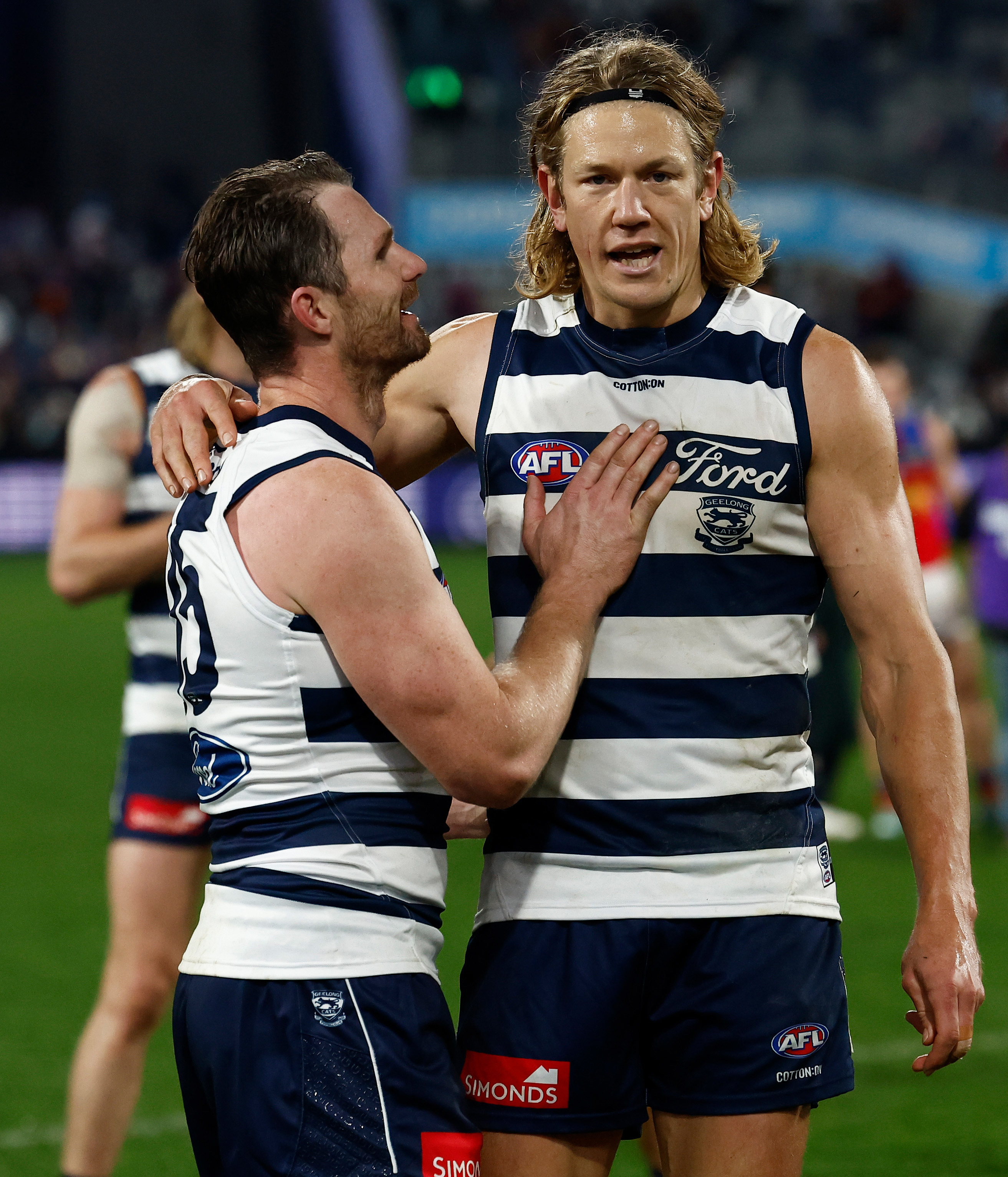 GEELONG, AUSTRALIA - JUNE 20: Patrick Dangerfield (left) and Rhys Stanley of the Cats are seen during the 2025 AFL Round 15 match between the Geelong Cats and the Brisbane Lions at GMHBA Stadium on June 20, 2025 in Geelong, Australia. (Photo by Michael Willson/AFL Photos via Getty Images)