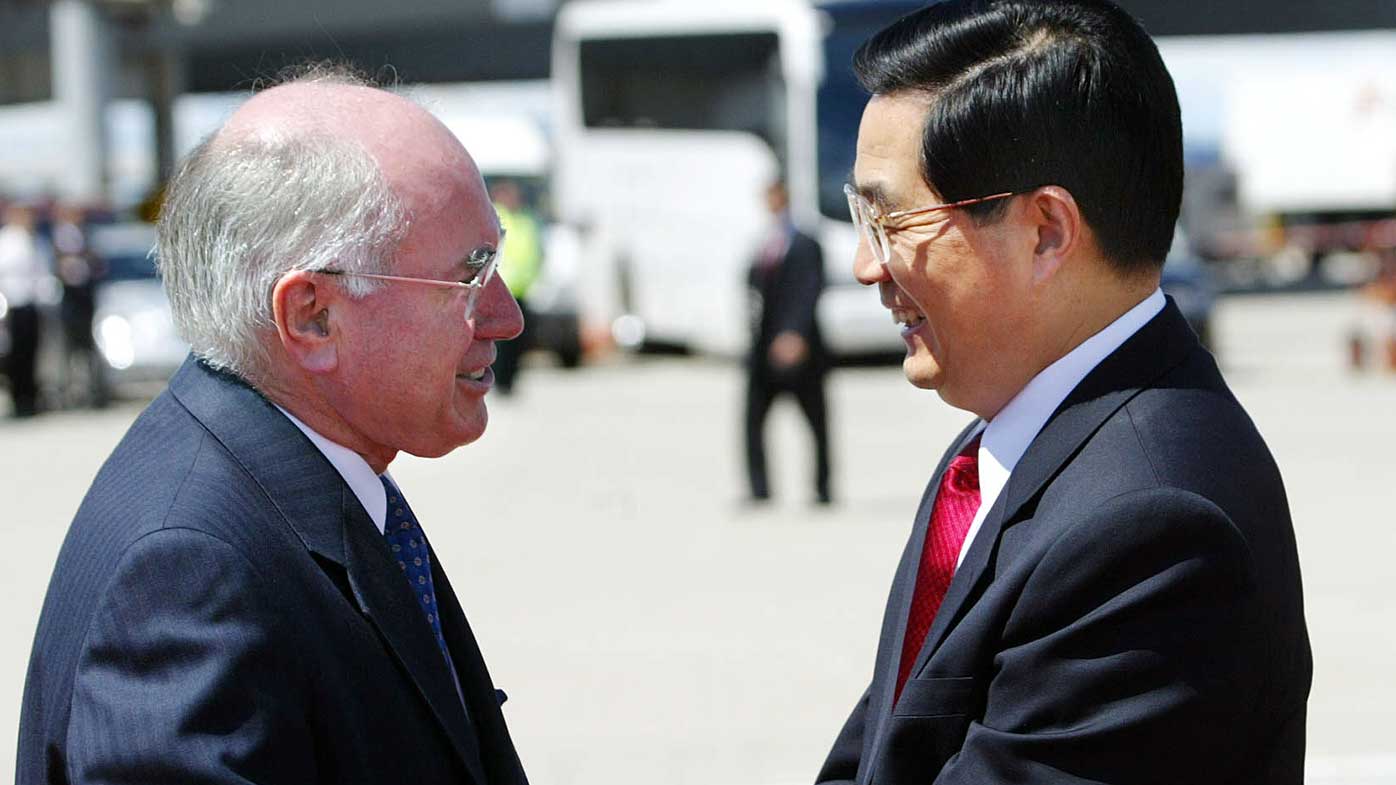 Hu Jintao in 2003, being welcomed to Australia by then-Prime Minister John Howard.