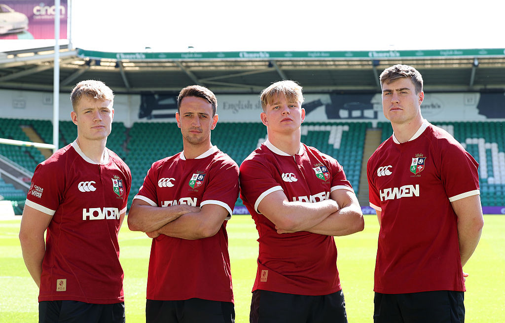 Fin Smith, Alex Mitchell, Henry Pollock and Tommy Freeman in their British and Irish Lions shirts.