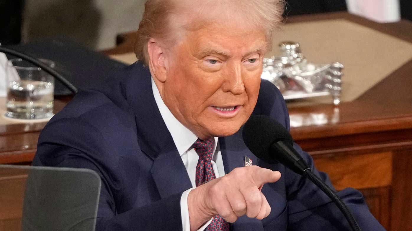 Cheers and jeers as Trump addresses tense Congress