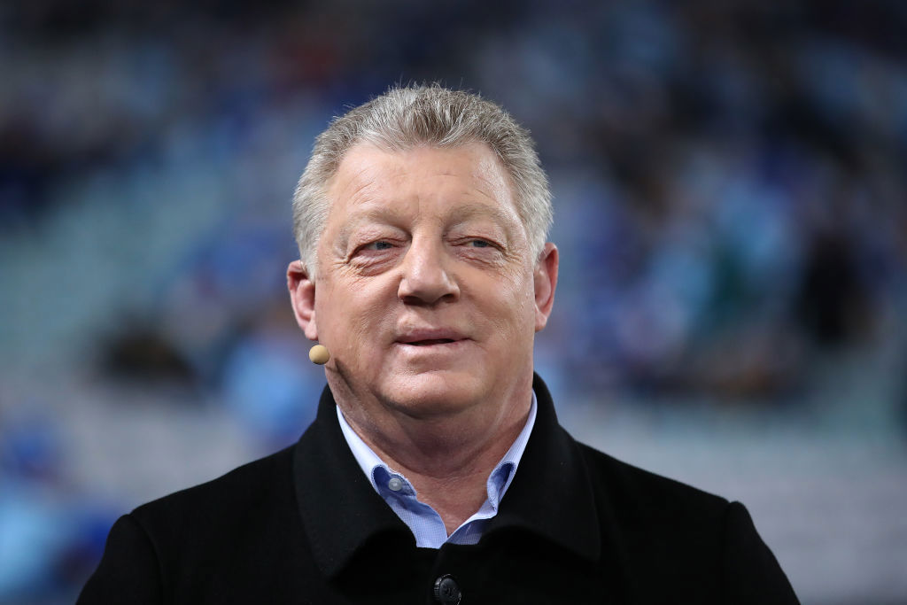 Phil Gould smiles during a tv broadcast.