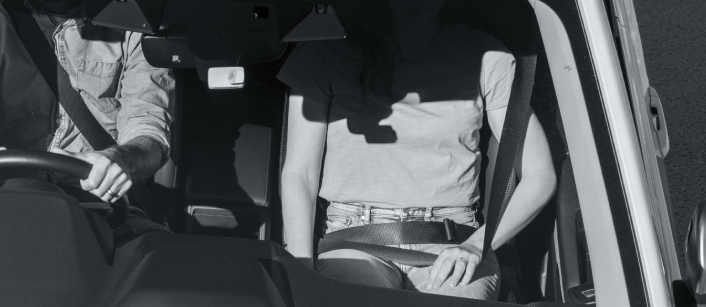 Holding your seatbelt away from your body is considered an offence.