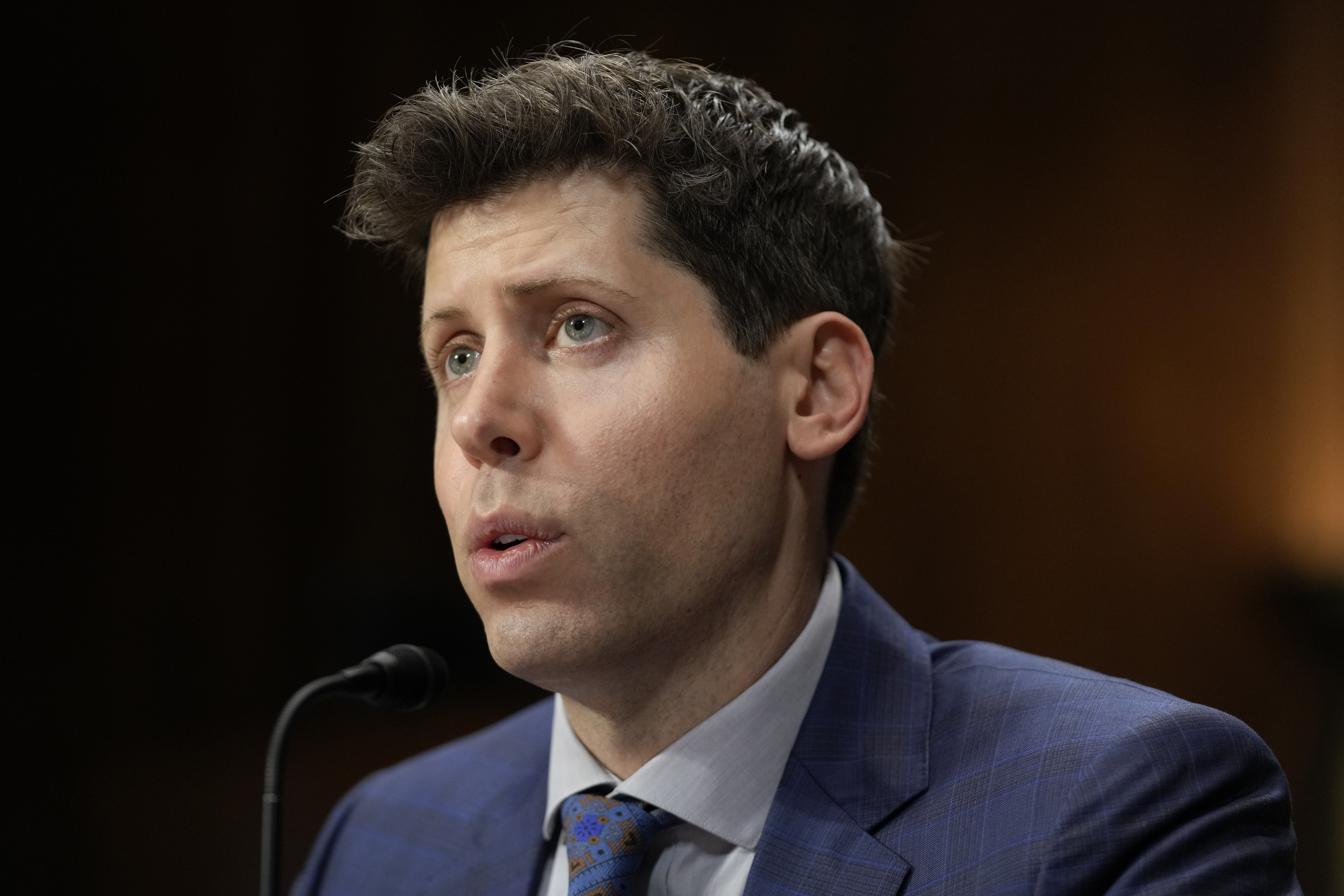 OpenAI CEO Sam Altman speaks before a Senate Judiciary Subcommittee on Privacy, Technology and the Law hearing on artificial intelligence, Tuesday, May 16, 2023, on Capitol Hill in Washington