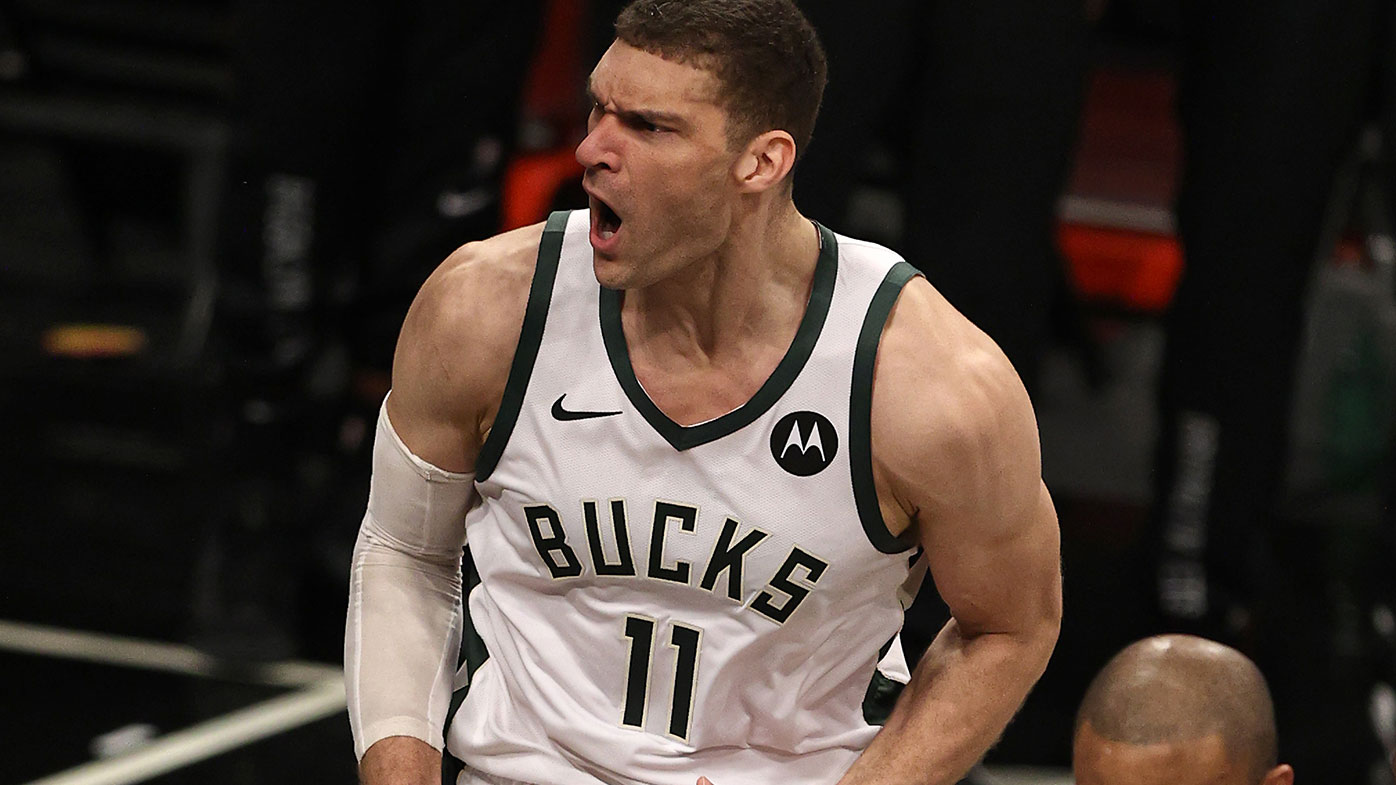 Brook Lopez #11 of the Milwaukee Bucks reacts after his shot in the second quarter against the Brooklyn Nets during game seven of the Eastern Conference second round at Barclays Center on June 19, 2021 