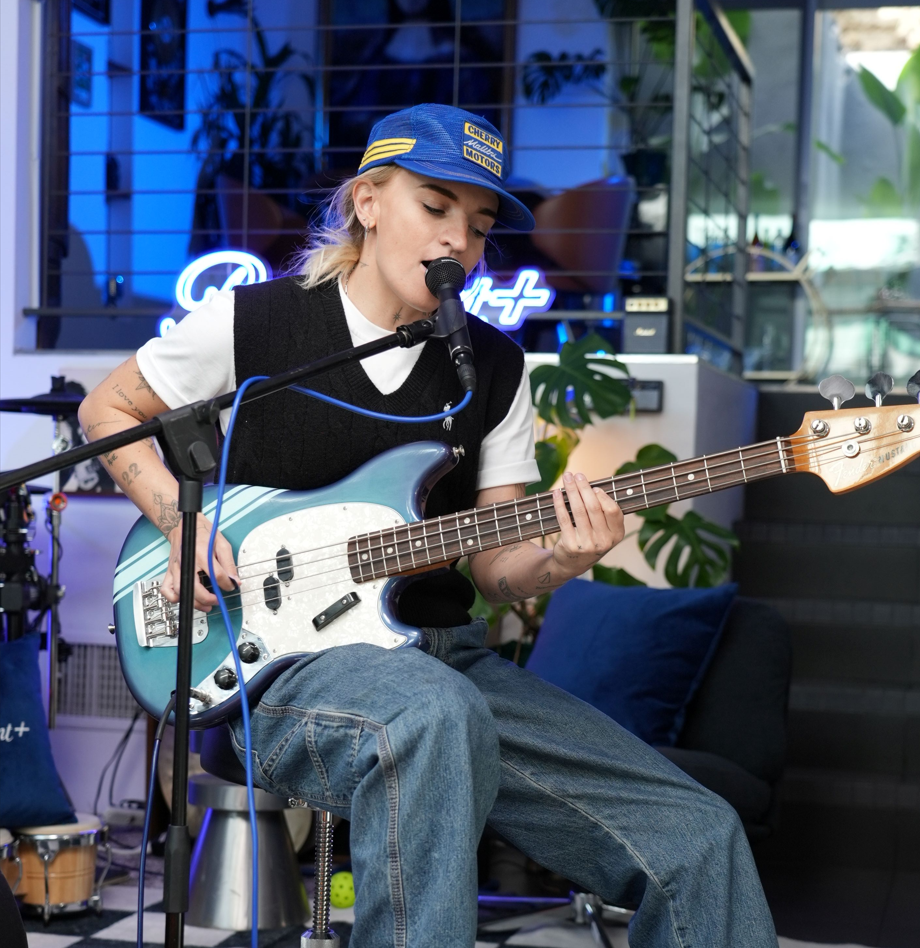 G FLIP playing guitar and singing 