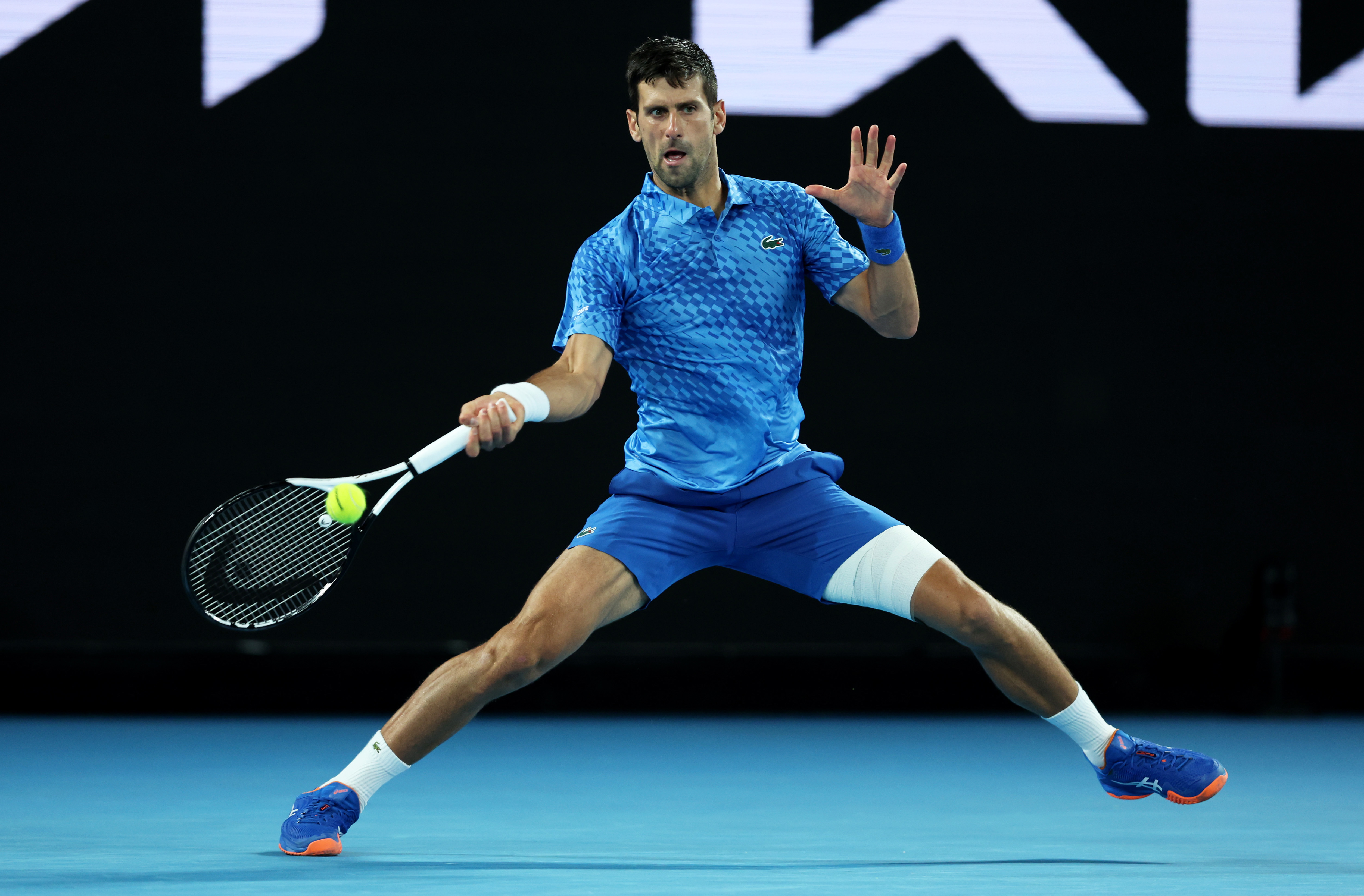 Novak Djokovic sported heavy strapping on his left leg in his first round match at the Australian Open.