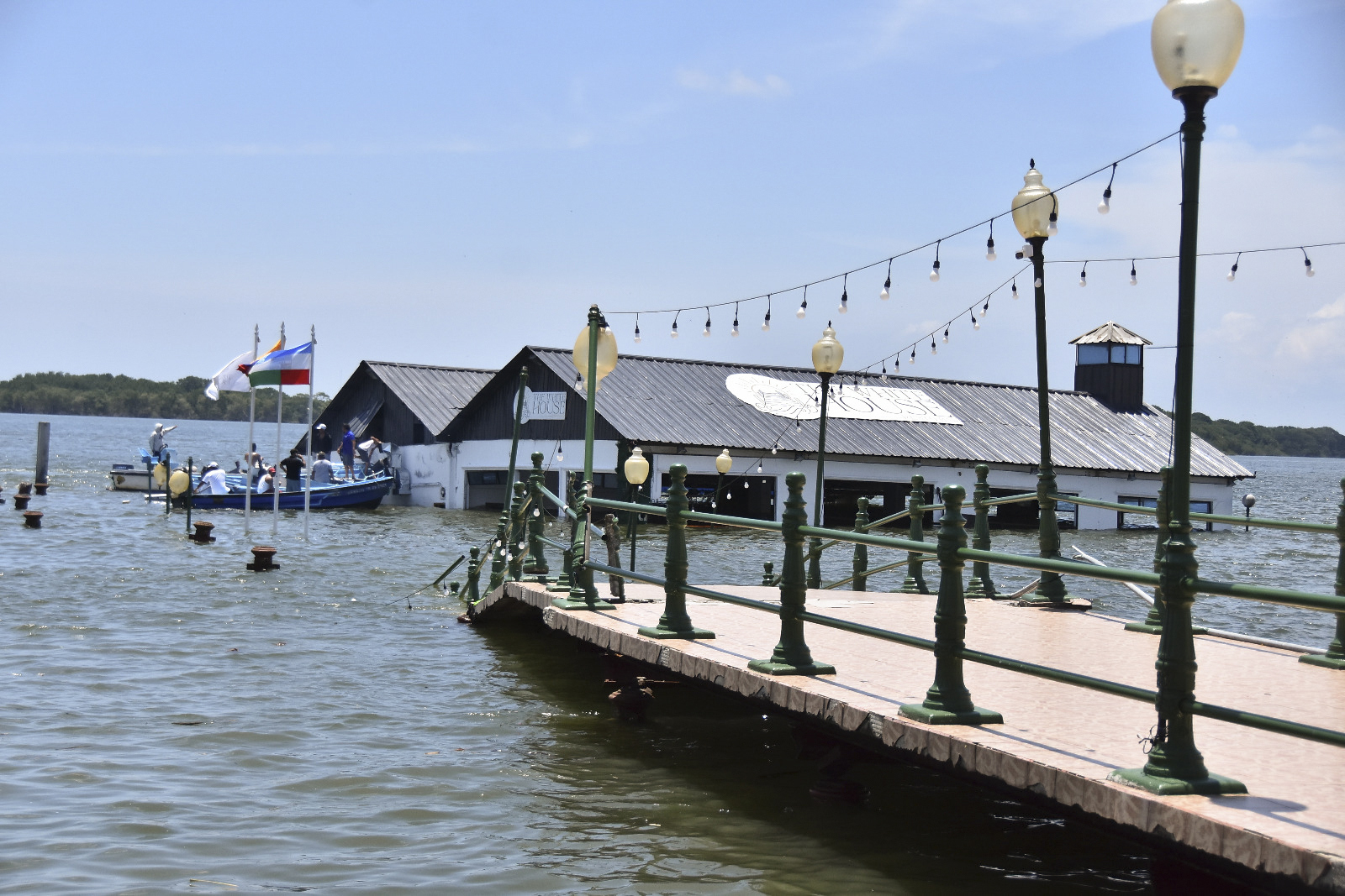 The Marine Museum of Puerto Bolivar, detached from the dock, is partially inundated in water after an earthquake that shook Machala, Ecuador, Saturday, March 18, 2023.