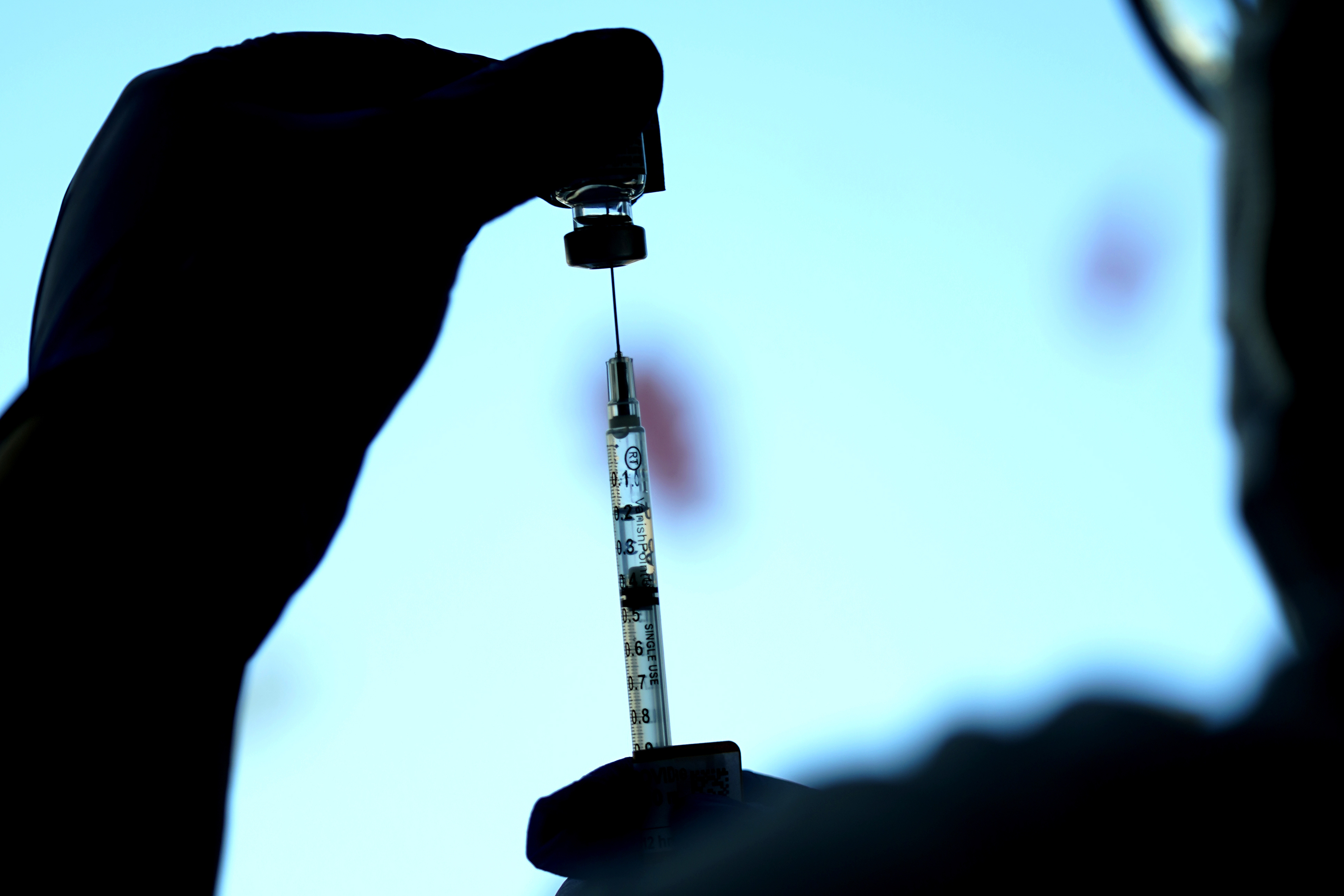 A dose of a Pfizer COVID-19 vaccine is prepared at Lurie Children's hospital, Nov. 5, 2021, in Chicago. 
