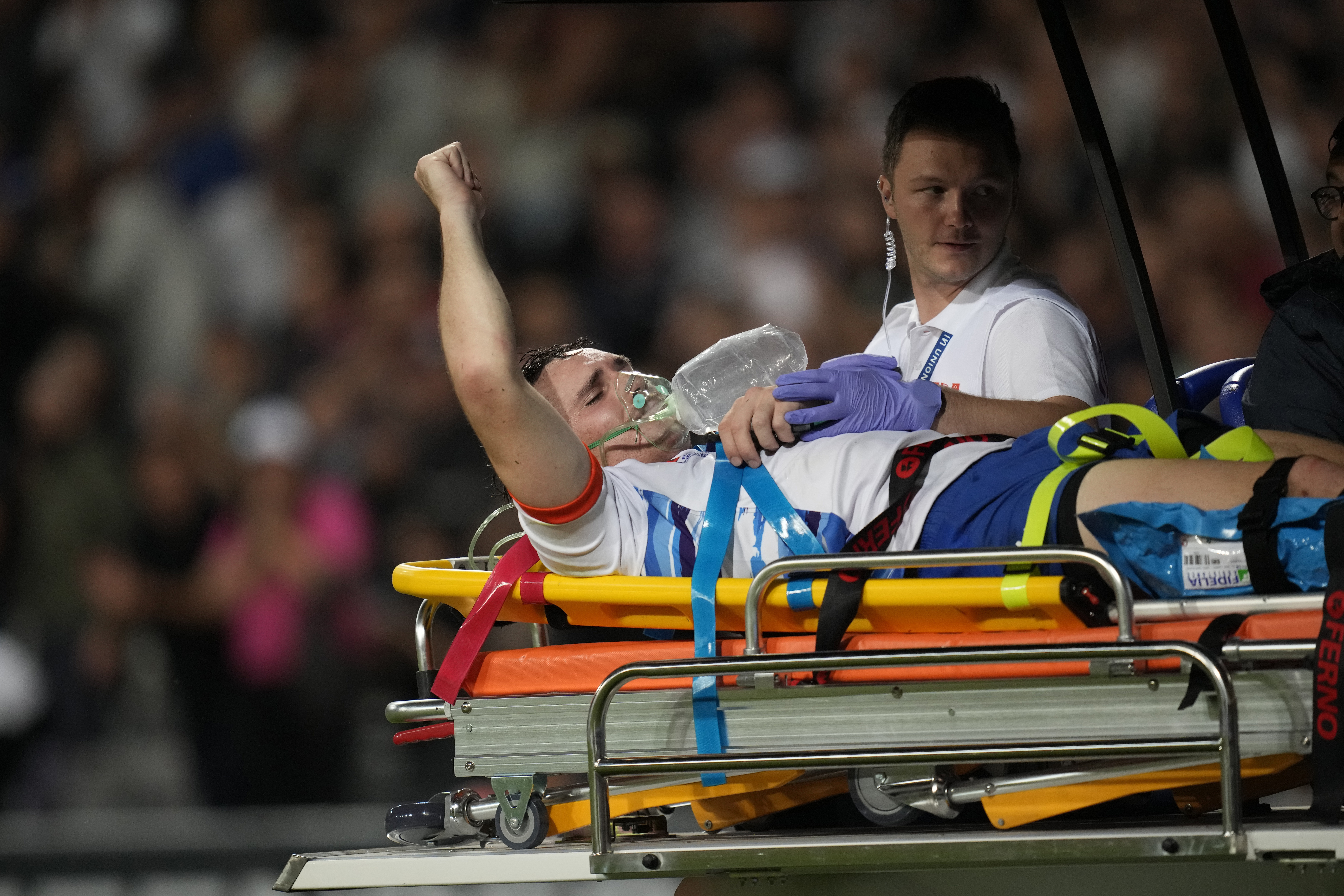 Le Roux Malan is taken off the field on a stretcher after getting injured during the Rugby World Cup Pool A match between New Zealand and Namibia.