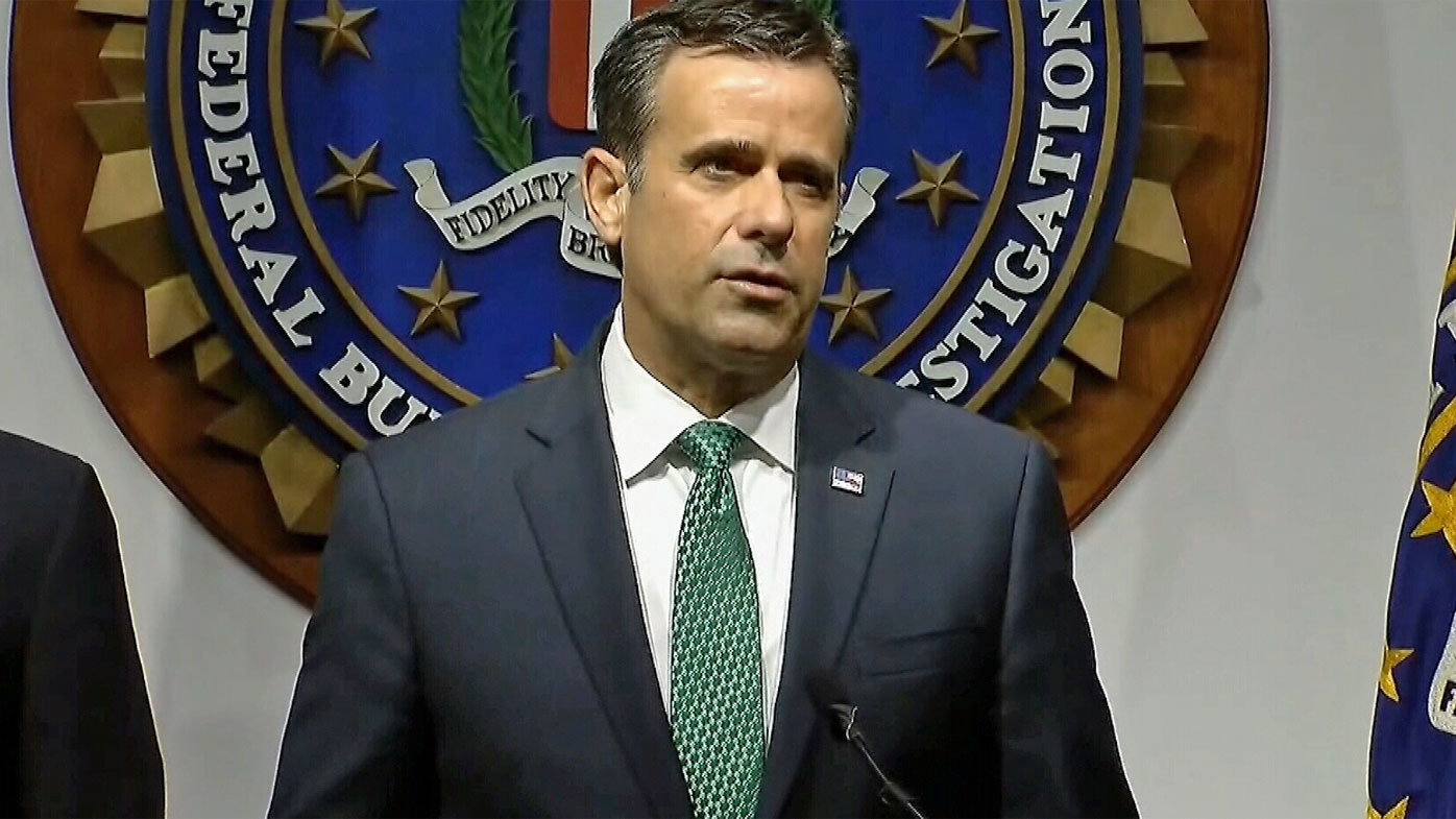 Director of National Intelligence John Ratcliffe speaking at the press conference.