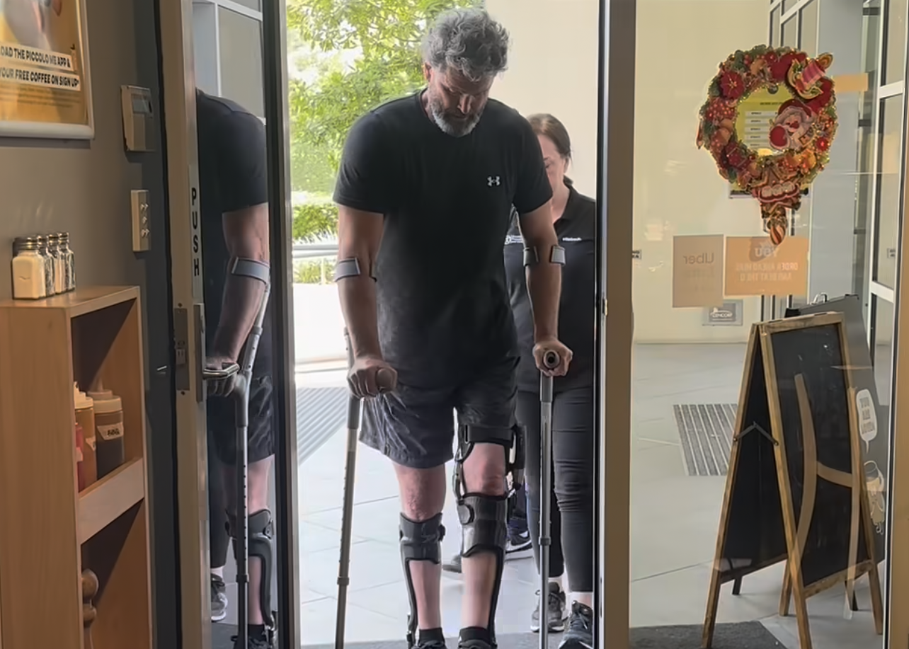Chris Cairns walks into a pub on crutches and sporting leg braces, two years after a heart attack and a subsequent spinal cord injury.