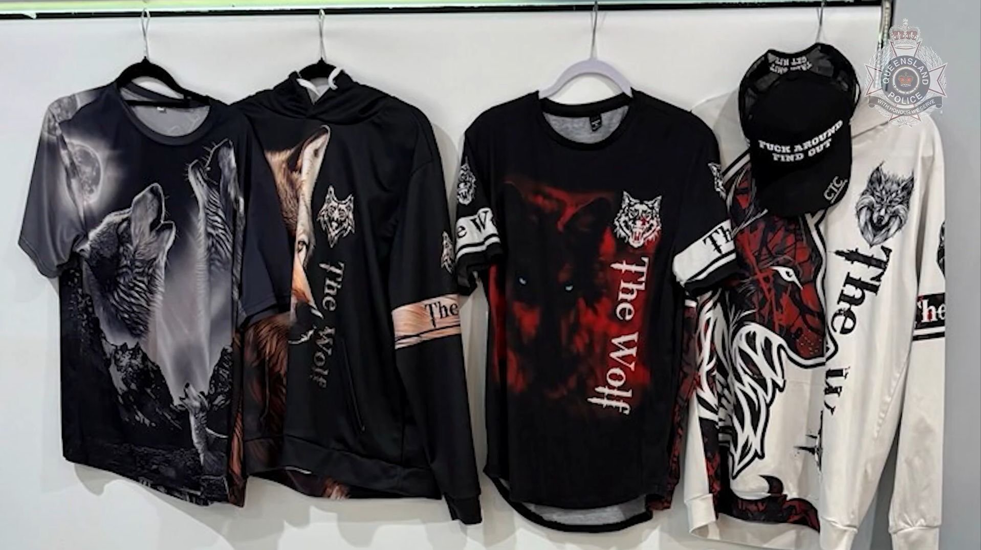 An alleged Lone Wolf bikie associate is one of two men charged over the kidnapping and extortion of a woman in Far North Queensland.