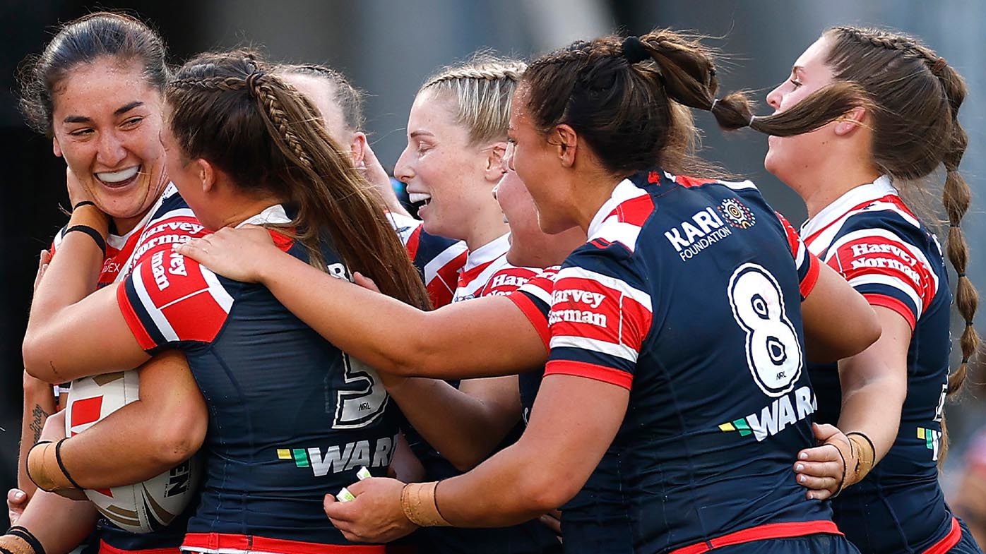 Olivia Kernick of the Sydney Roosters celebrates with teammates after scoring a try during the NRLW grand final match between the Sydney Roosters and Cronulla Sharks.