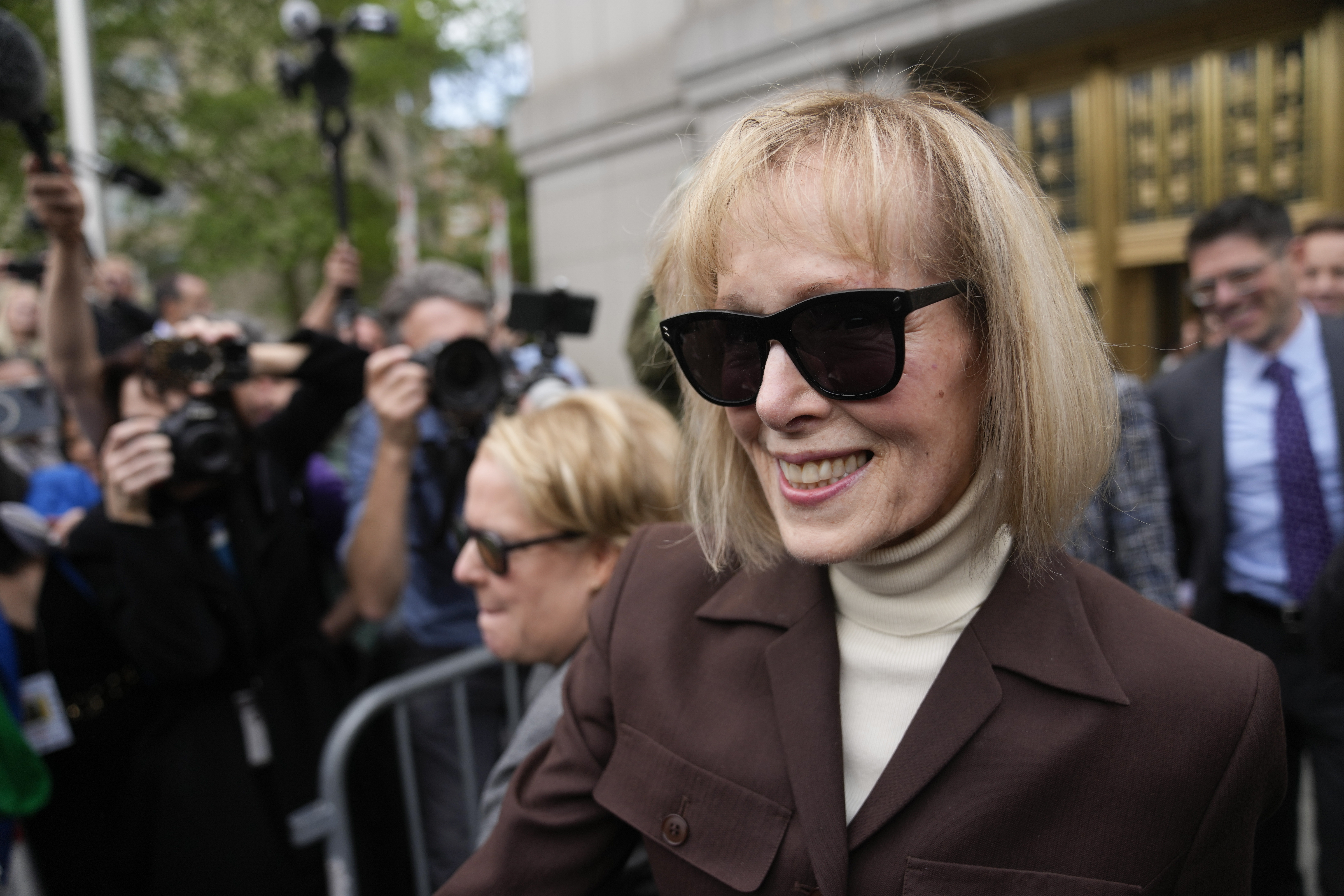 Jean Carroll walks out of federal court May 9, 2023, in New York. 