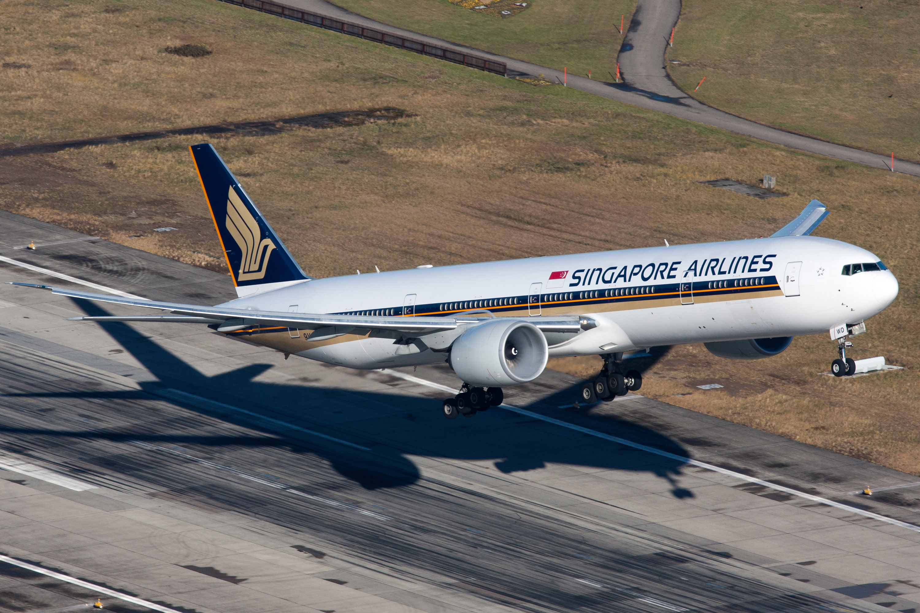 "Zurich, Switzerland - December 05, 2007: Boeing 777-300 of Singapore Airlines departing Zurich airport."
