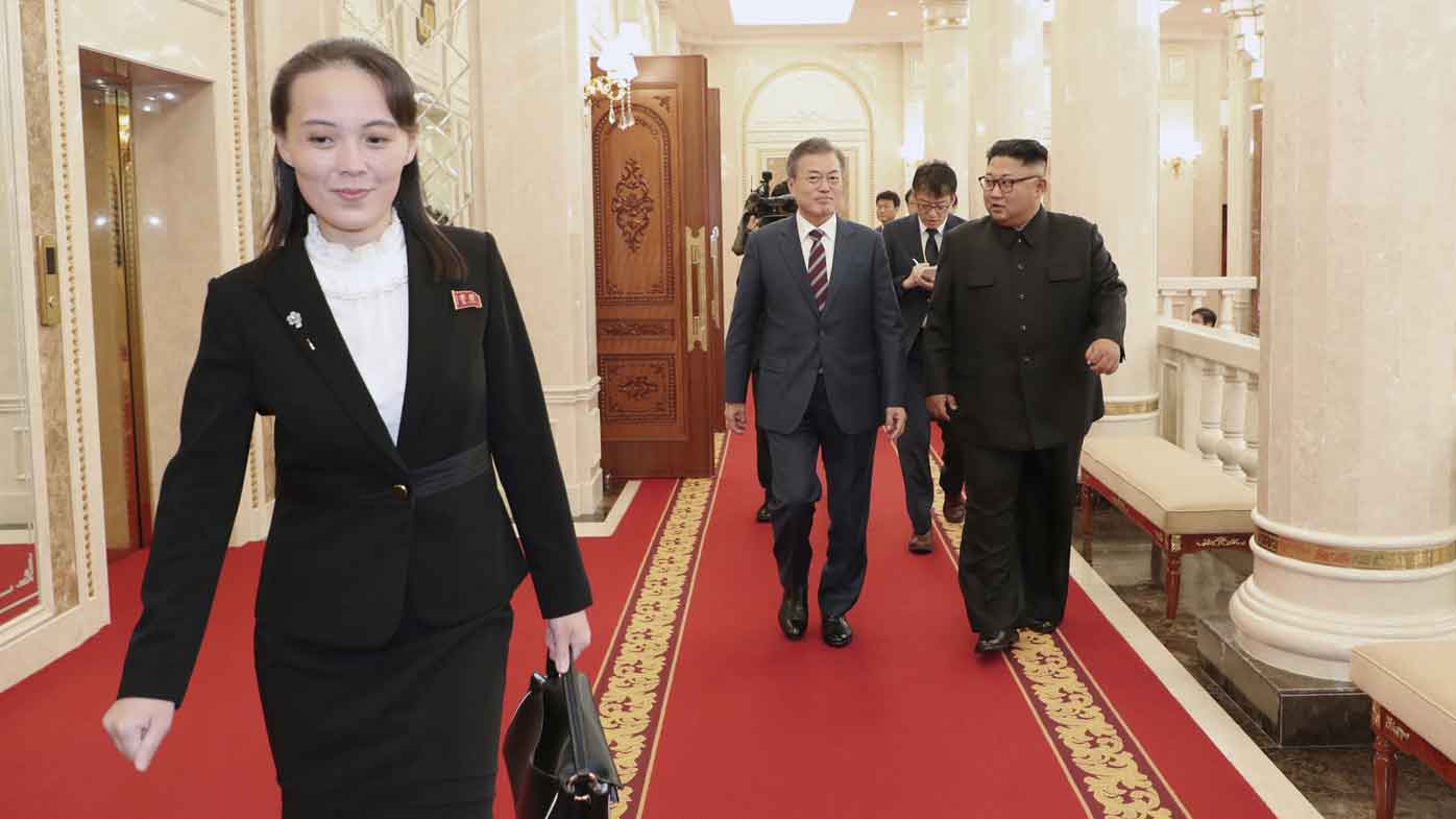 Kim Yo Jong walks ahead of South Korean President Moon Jae-in and North Koran leader Kim Jong Un, right, arrive at the headquarters of the Central Committee of the Workers' Party in Pyongyang, North Korea.