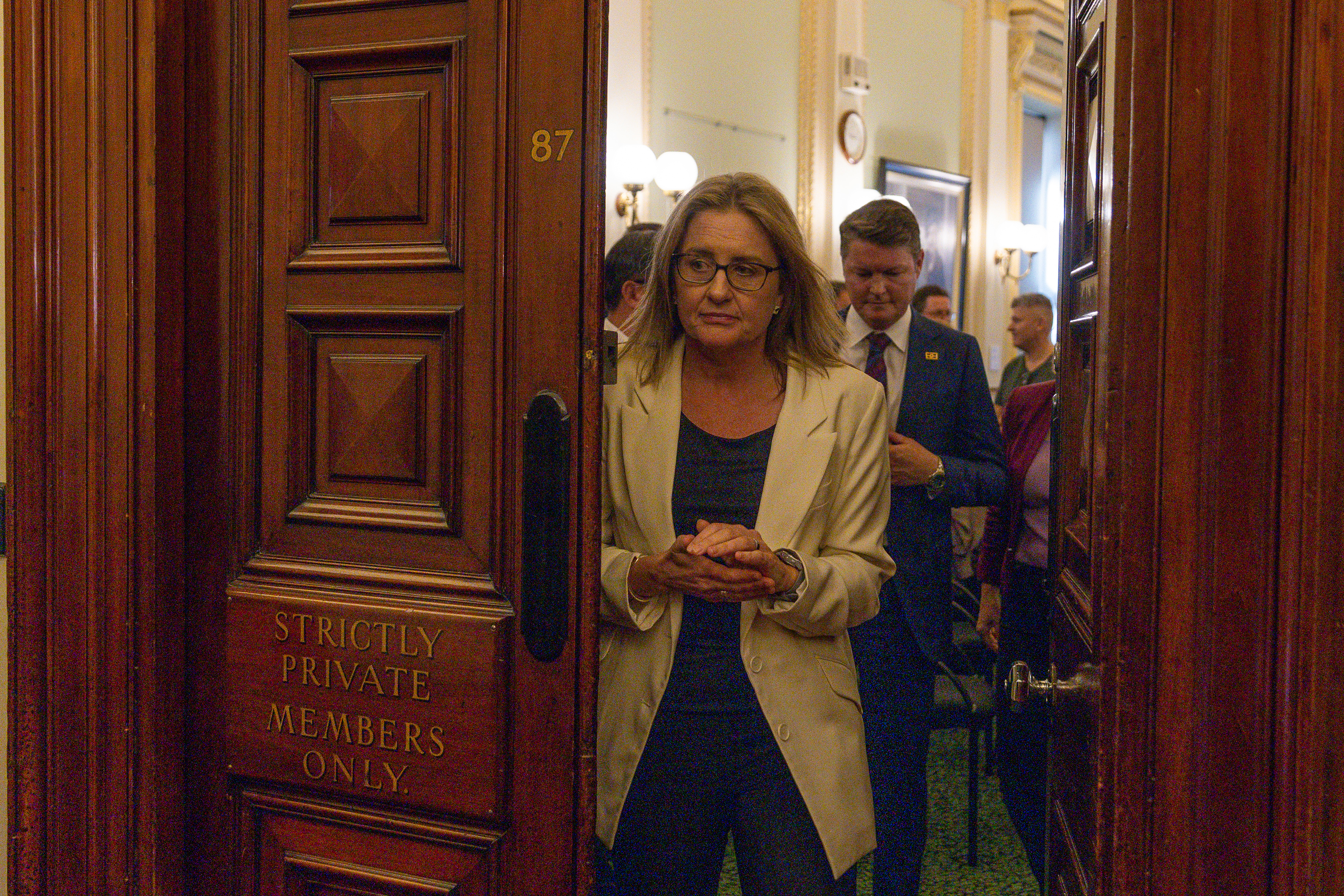 Jacinta Allan exits the caucus room after being elected unopposed.