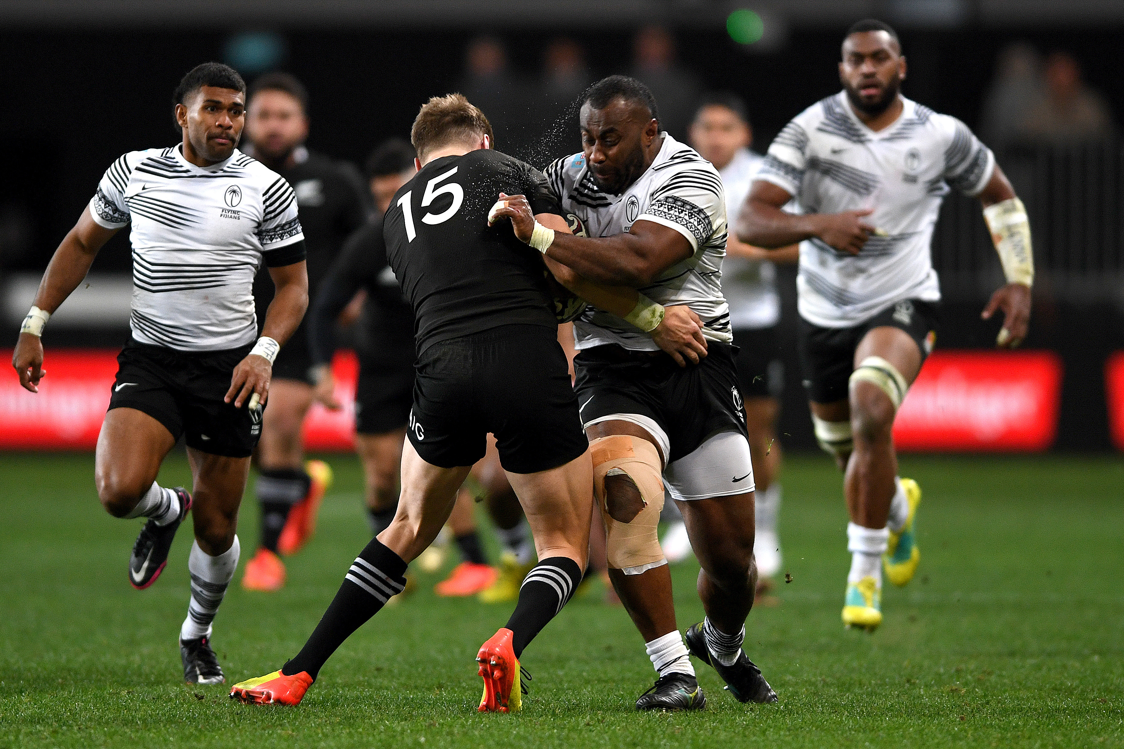 Peni Ravai of Fiji runs into the defence.