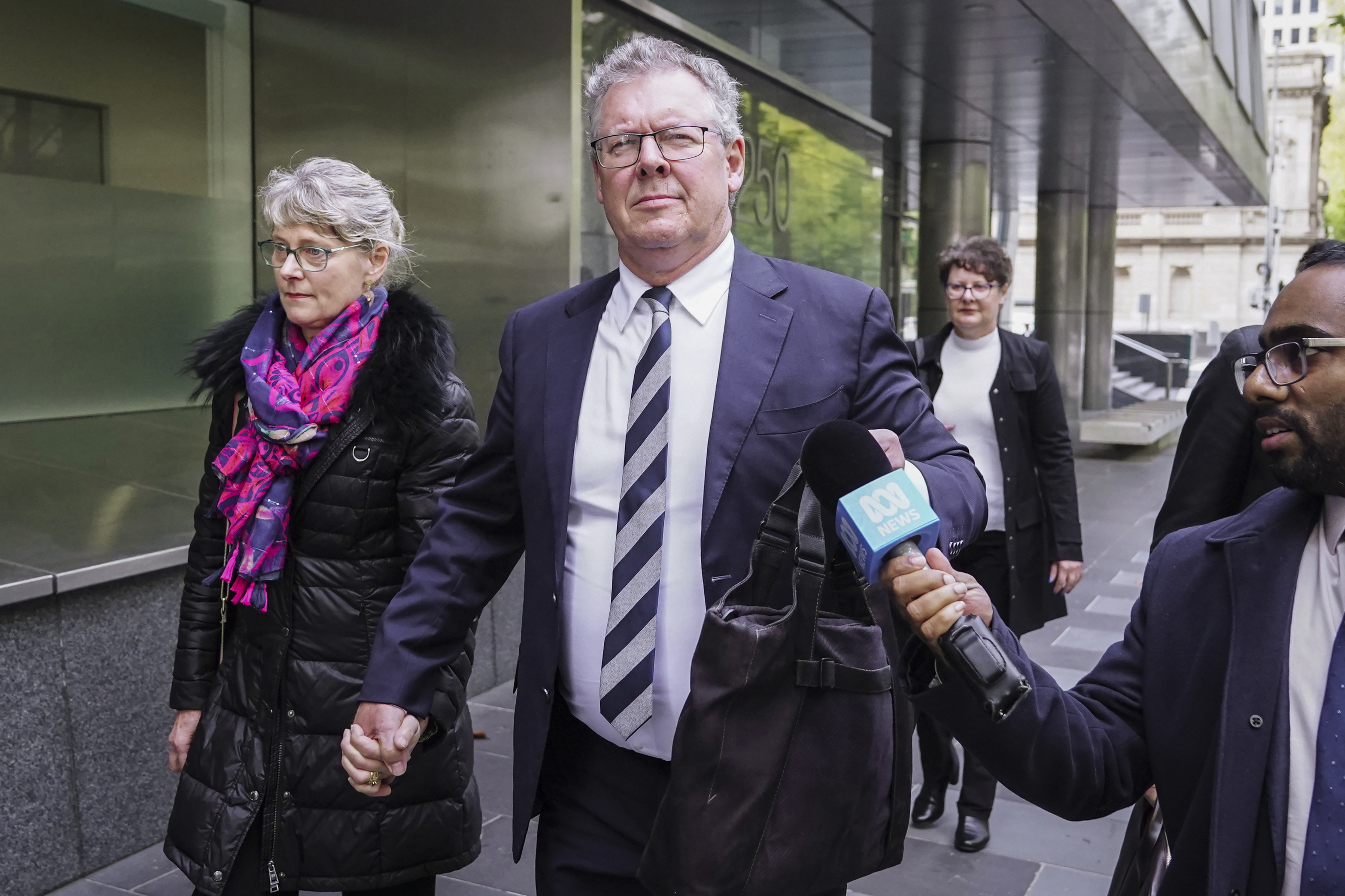 Photo of  Norman O'Bryan leaving the county court with his wife on Thursday 14 May 2026. LUIS ENRIQUE ASCUI