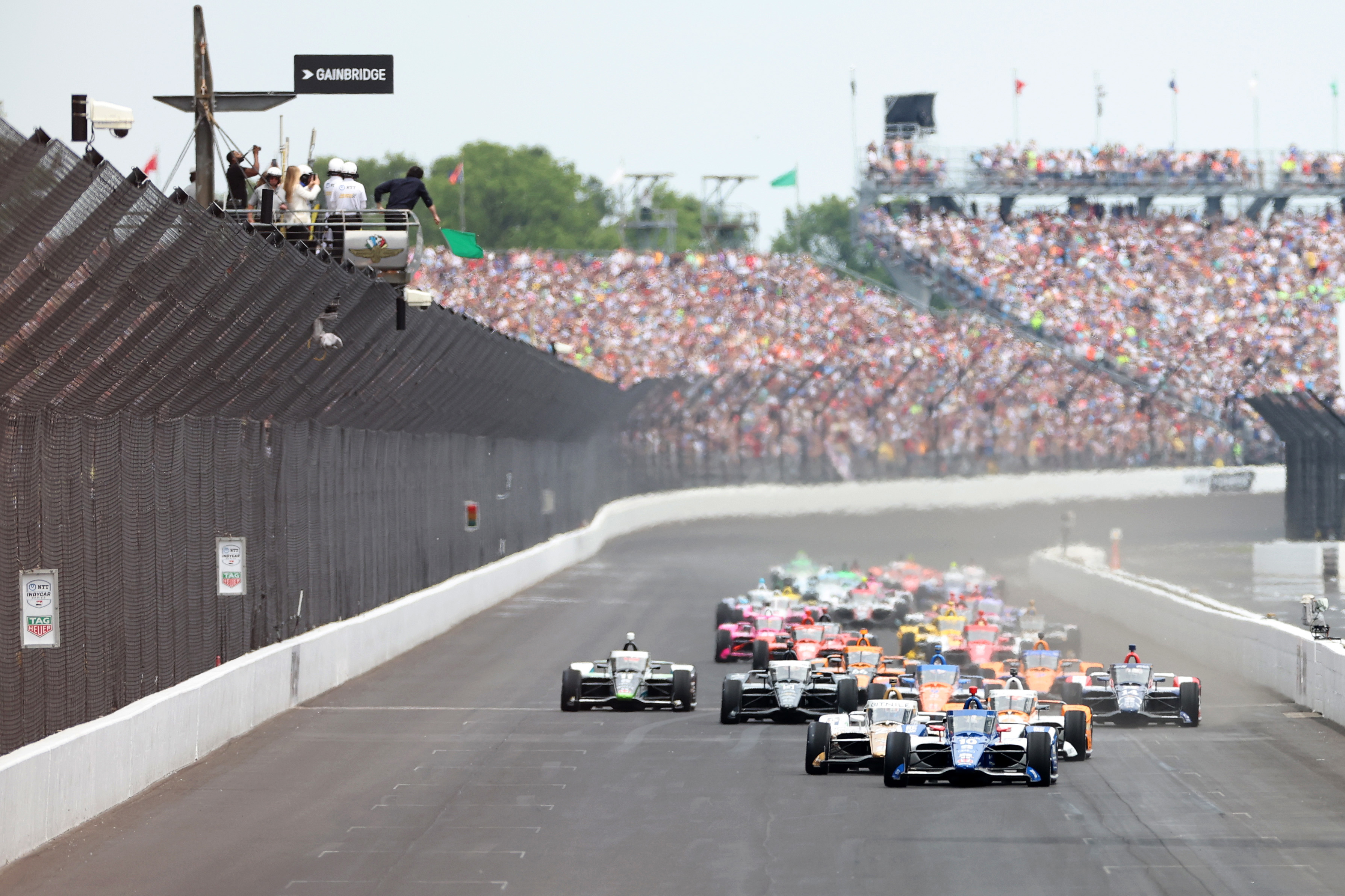 Alex Palou leads the pack of drivers at the start of The 107th running of the Indianapolis 500 at Indianapolis Motor Speedway.