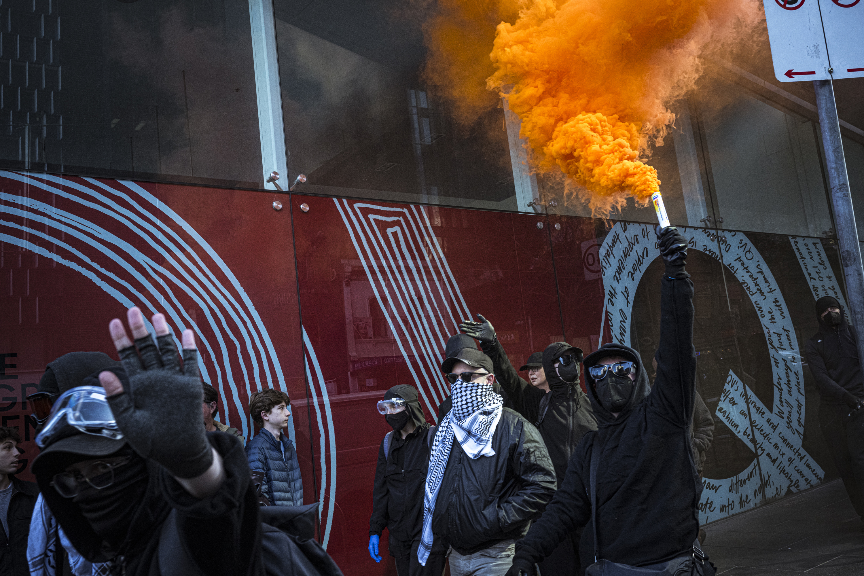A flare was used during the protest in the Melbourne CBD this morning.