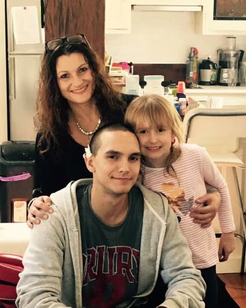 Louise's son Reggie, pictured with his sister Jessica.